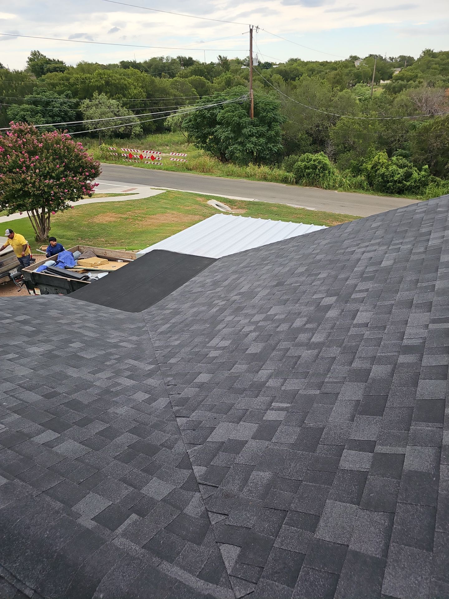 Residential Roofing Installation using Owens Corning Oakridge Onyx Black by DeZign Roofing & Exteriors