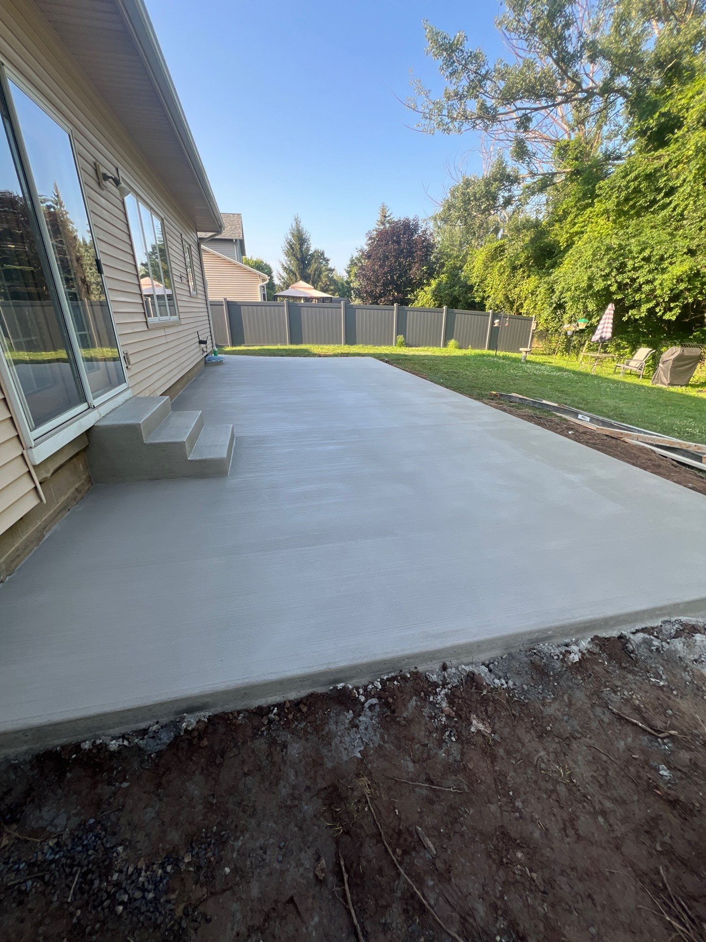 Broom Finished Patio  by NG Masonry & Construction LLC