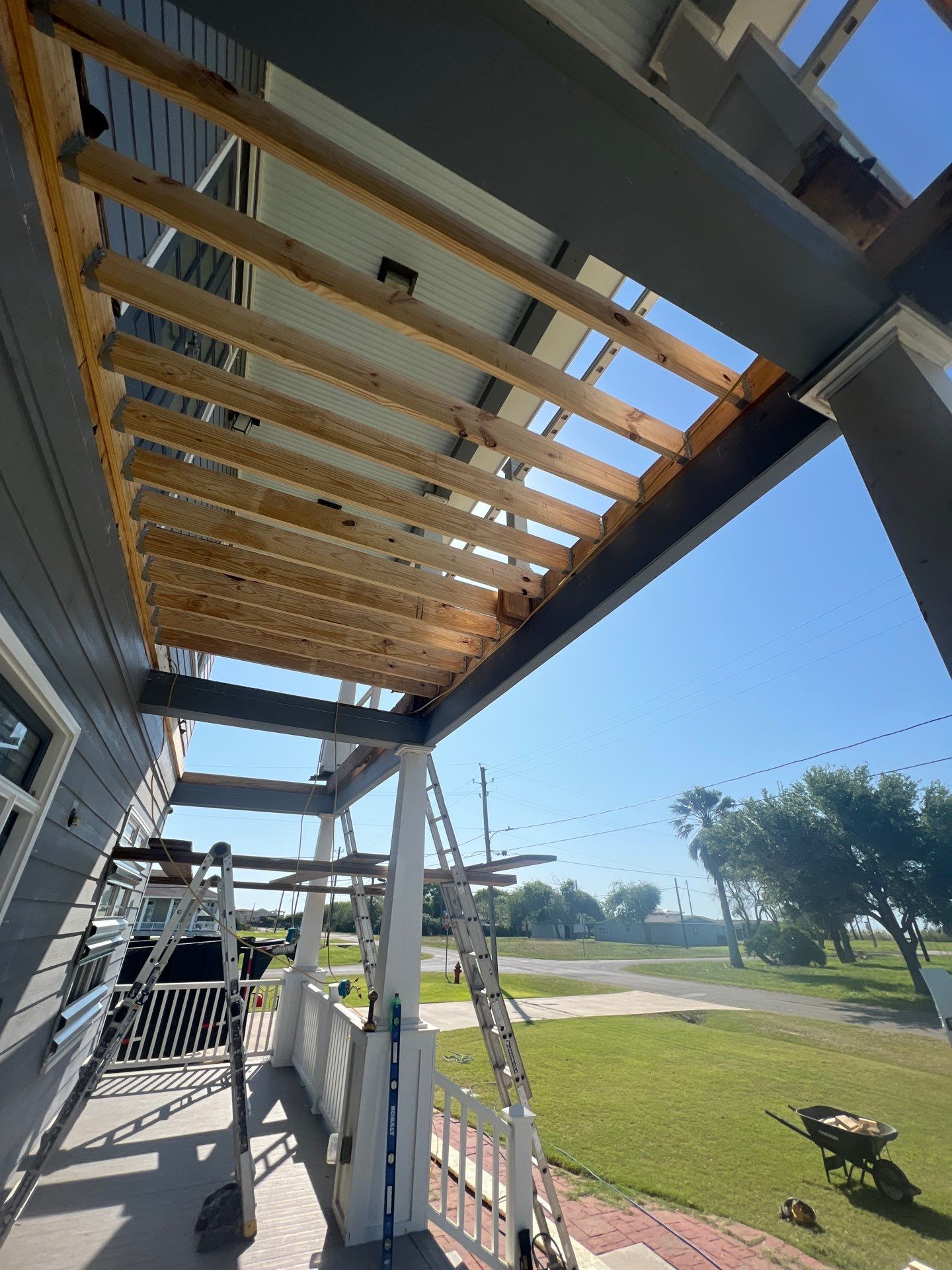 Patio? We got you Covered! by Bayfront Roofing and Construction