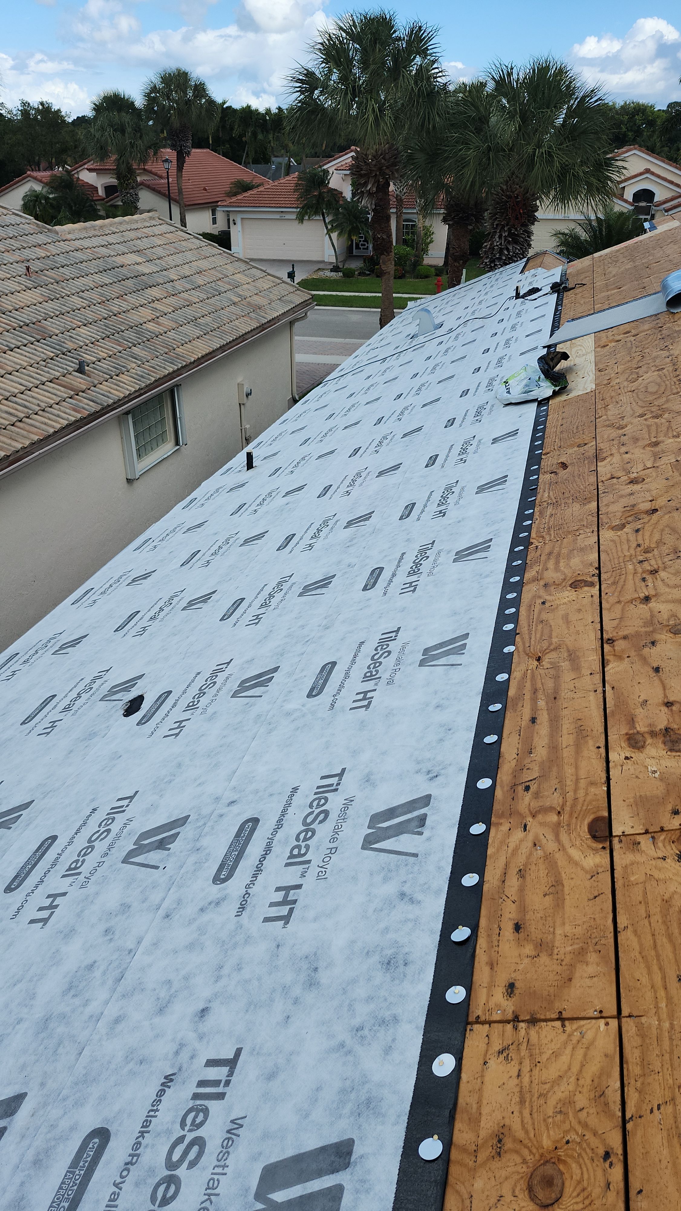 Residential Concrete Tile Roof Replacement and Fascia Repair in Boca Raton by Aastro Roofing