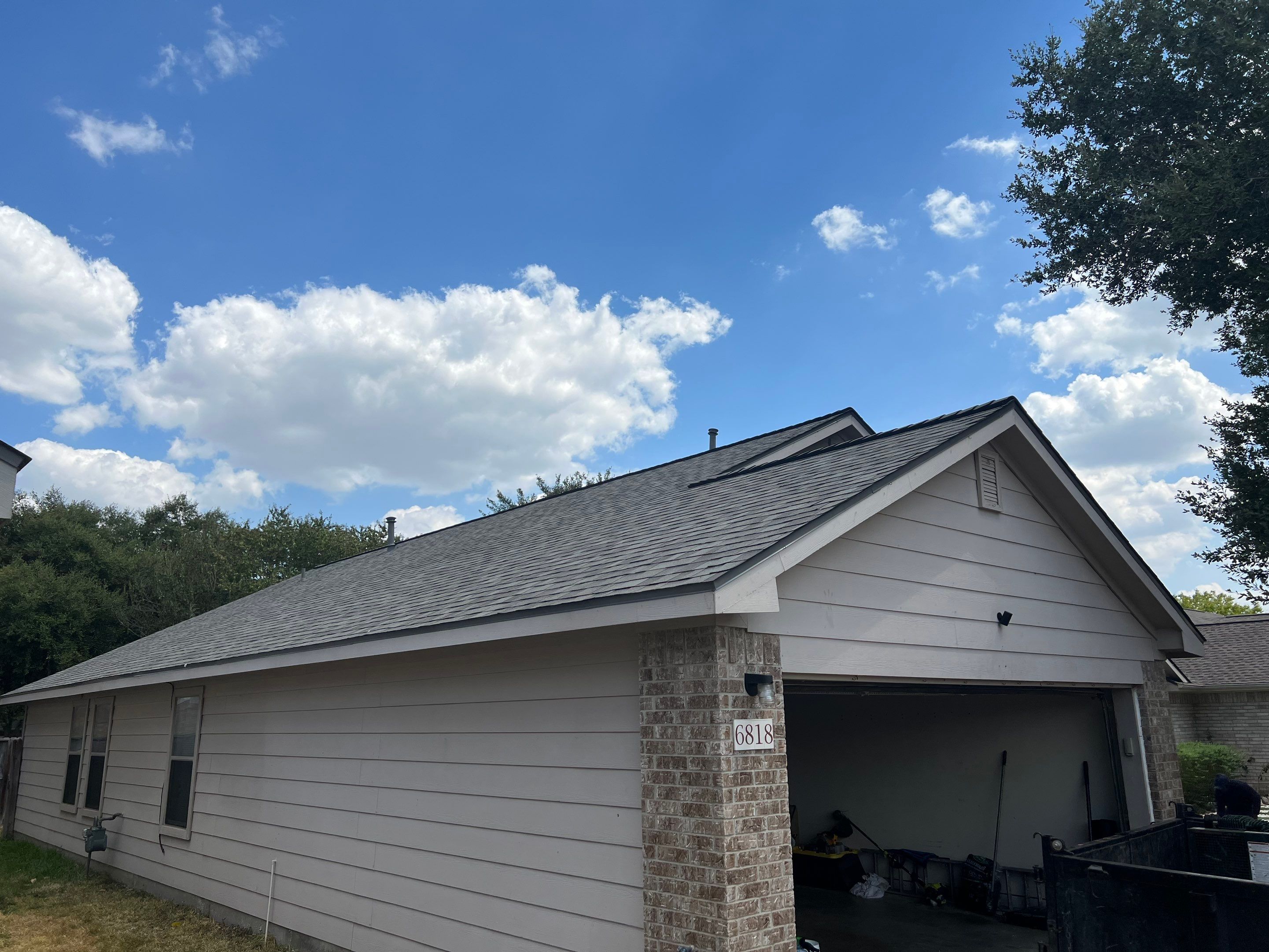 AMIG approved this roof for wind damage, fascia painting, and window work. by Roof Repair Company
