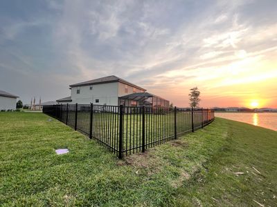 Aluminum Fence Installation using Black 3 Rail Aluminum Fence