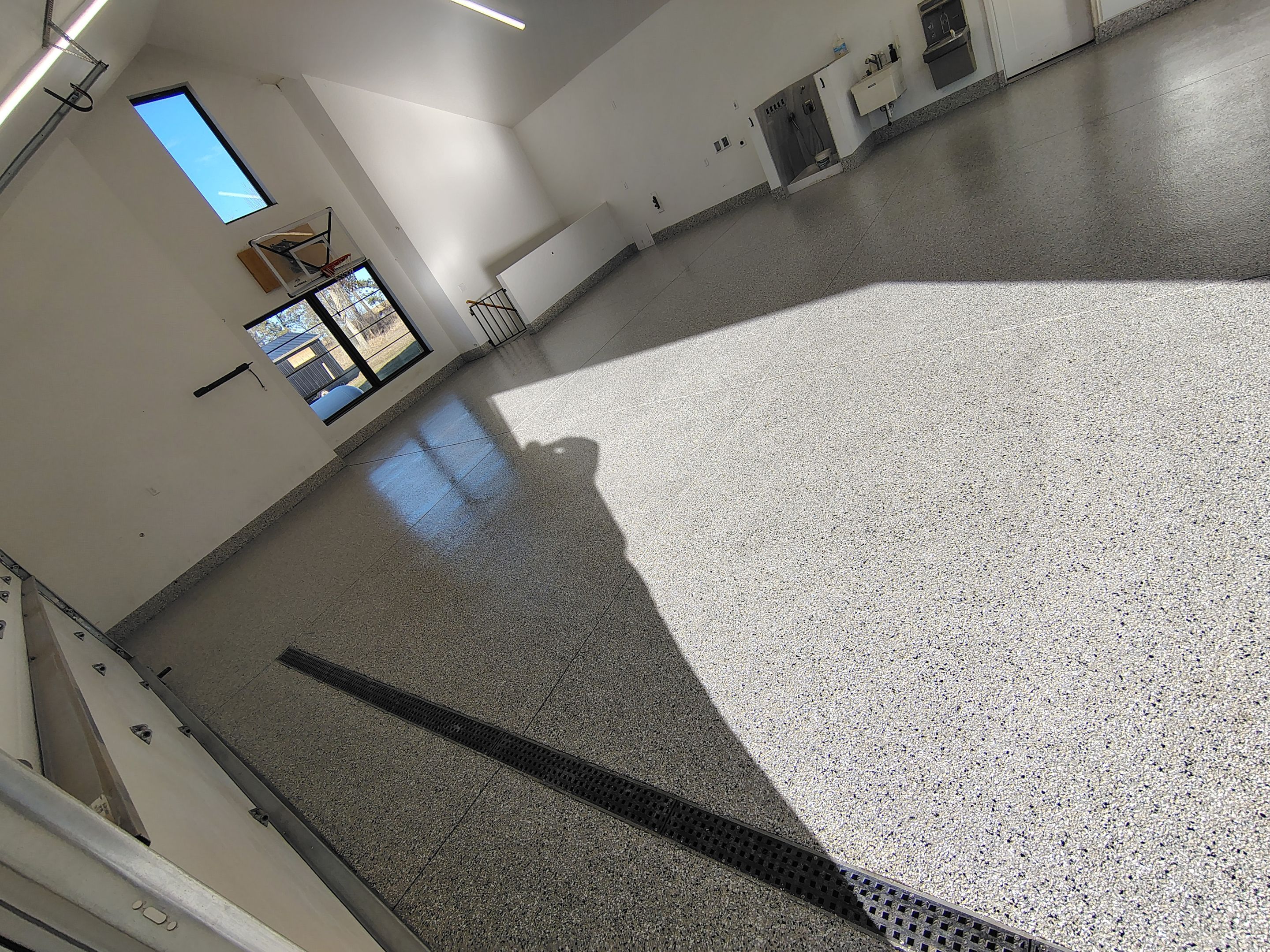 Epoxy Flake Garage Floor and Stair Coating in Sioux Falls by Select Painting, Coatings & Garage Cabinets