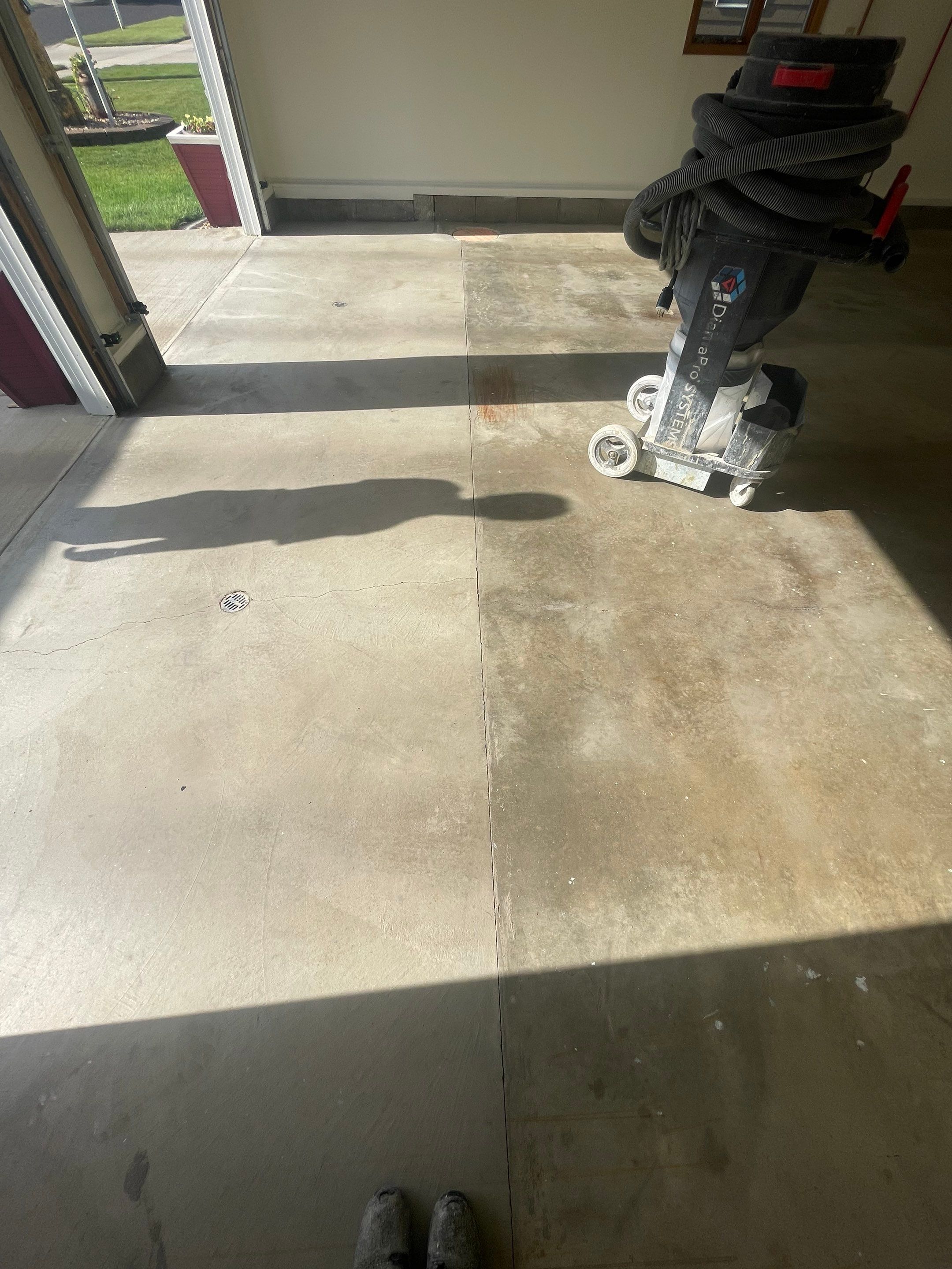 Madison Garage Concrete Coating with Feather Grey Speckle Finish by Select Painting, Coatings & Garage Cabinets