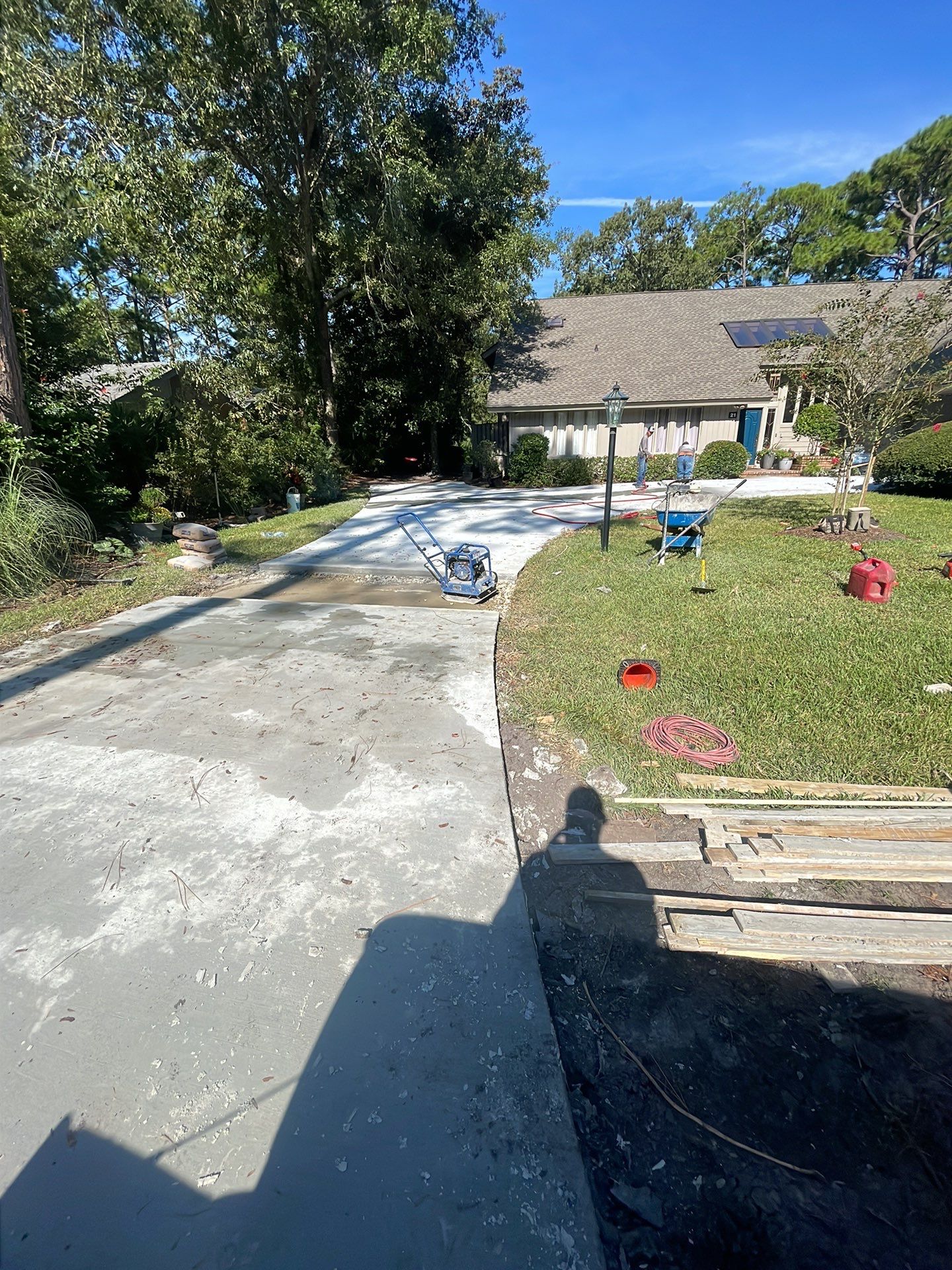 Concrete Driveway Replacement with Decorative Paver Inlay in Hilton Head Island by Lowcountry Scapes, LLC