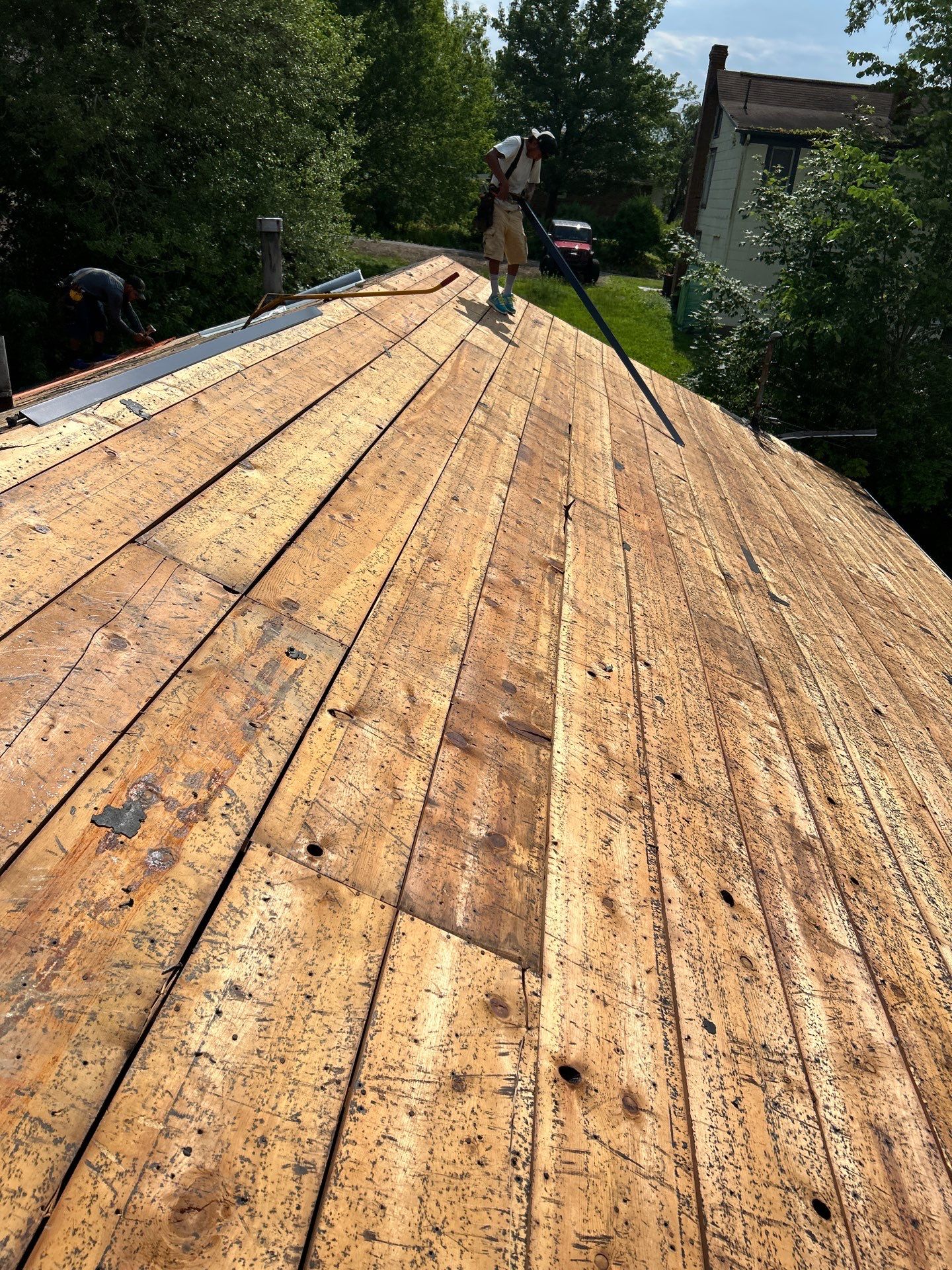 Residential Roofing Installation using GAF Timberline HDZ Oyster Grey by Rainstoppers Roofing