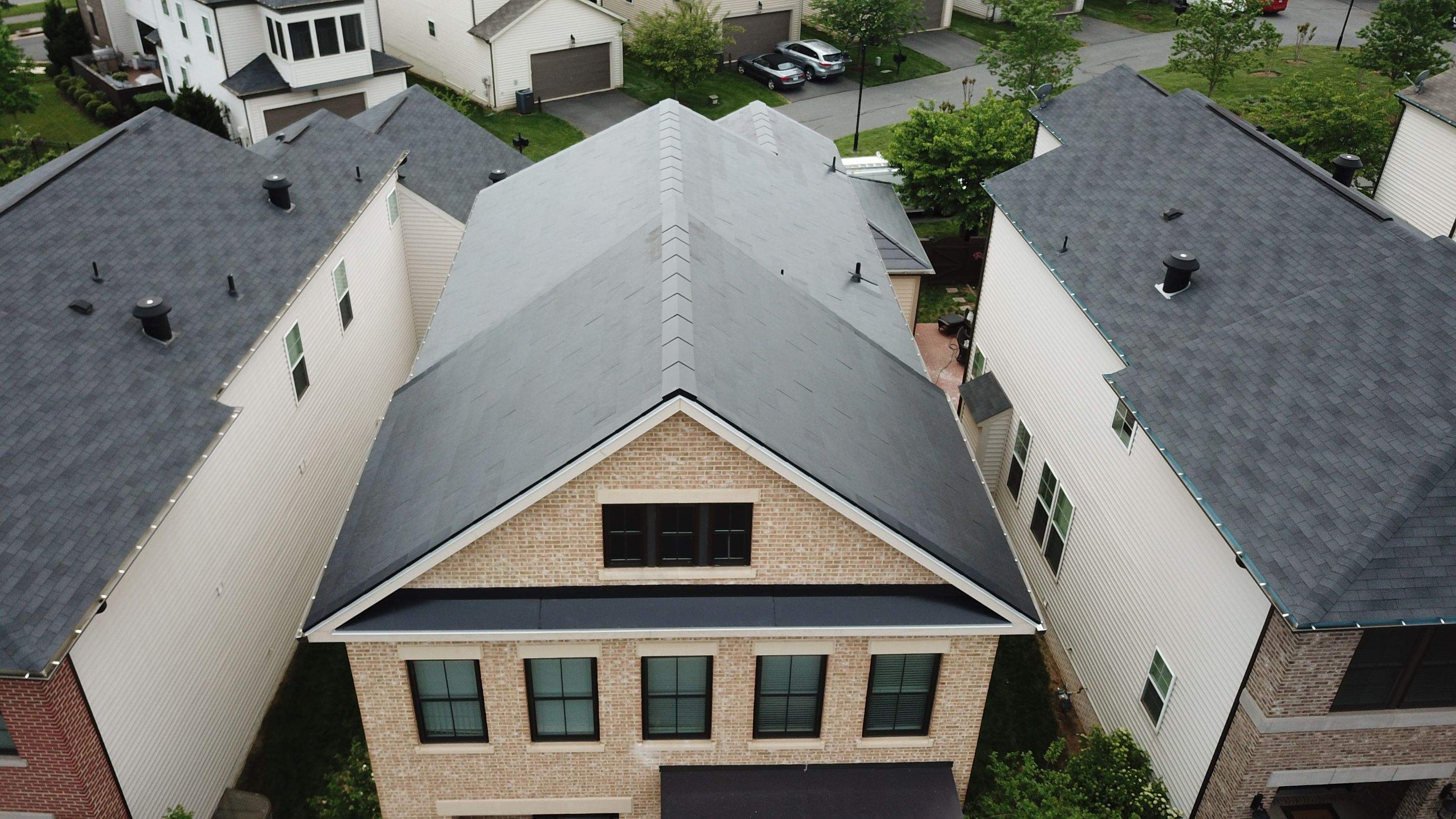 Tesla Solar Roof using Tesla Solar Roof V3 tiles by American Home Contractors