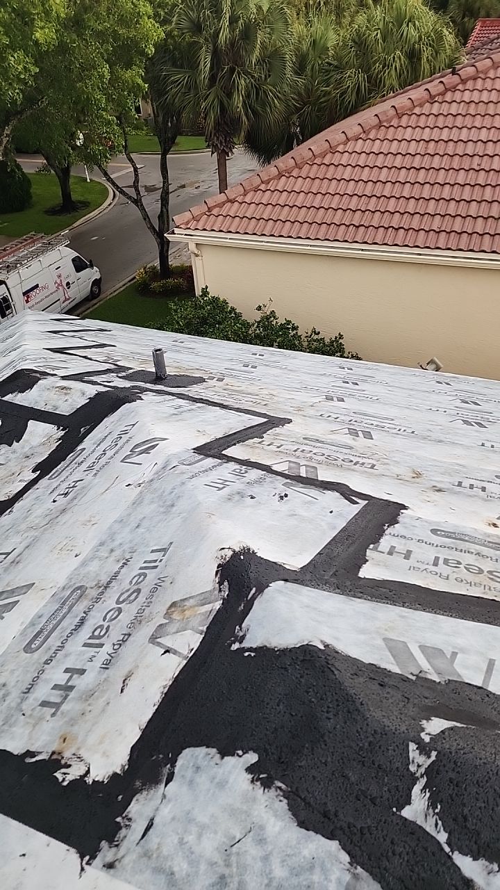 Red Concrete Tile Roof Replacement for Coral Springs Residence by Aastro Roofing