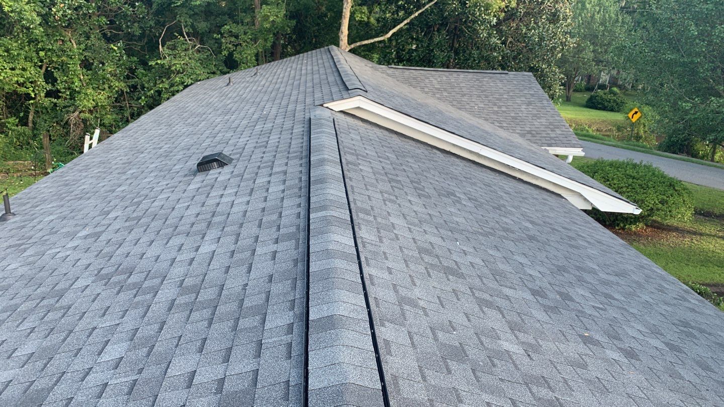 Hail Damage using Atlas Pristine Pinnacle Shingles by Artigues Roofing & Restoration Services