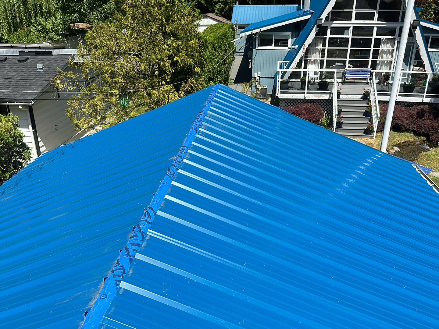 Residential ReRoofing Installation using Duraclad 26ga by Top Notch Roofing Inc