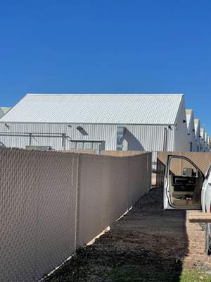 Light Commercial using 6' chain link with slats