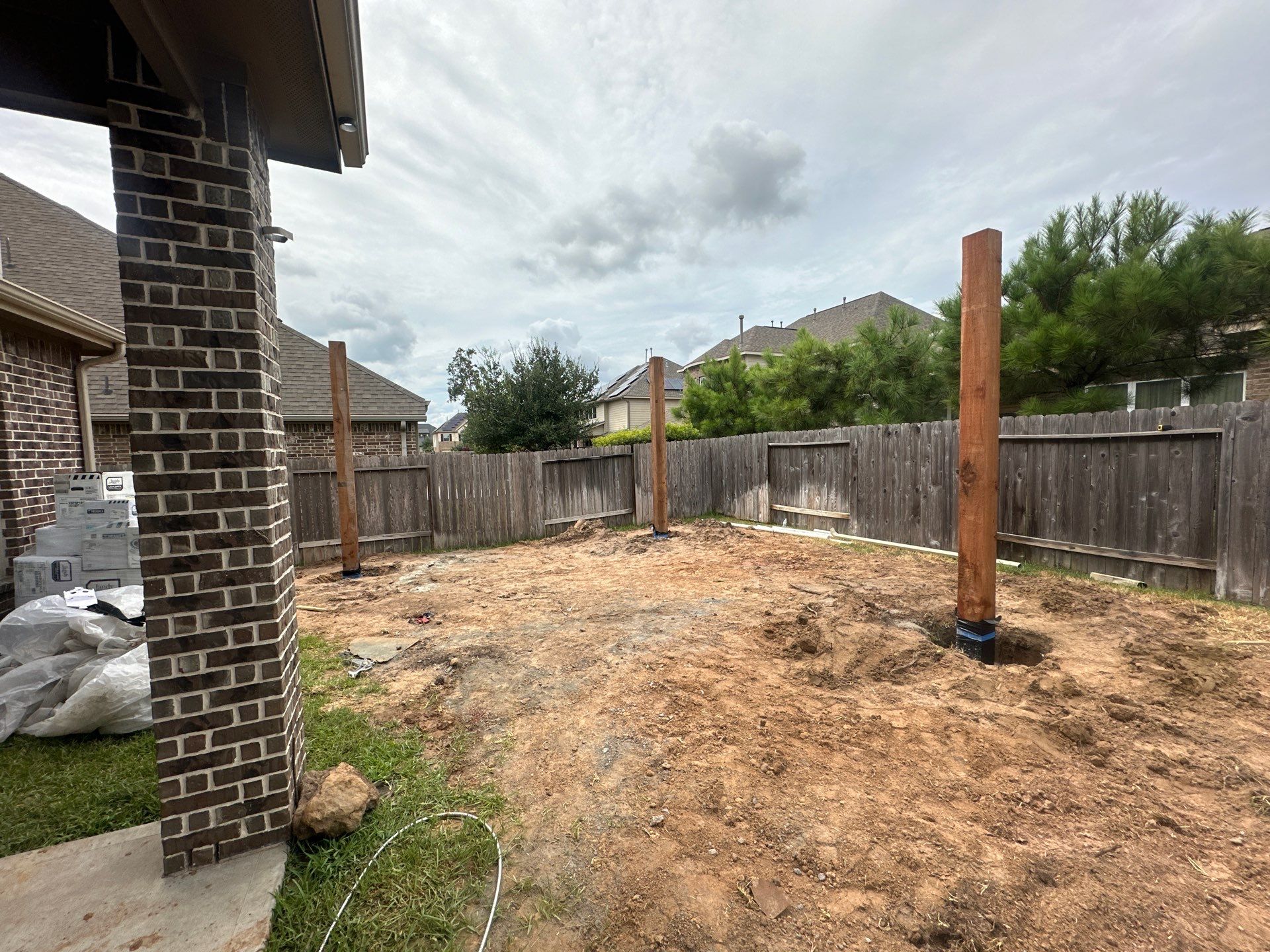 Covered Patio and Summer Kitchen in Spring,  TX by SophAlx LLC