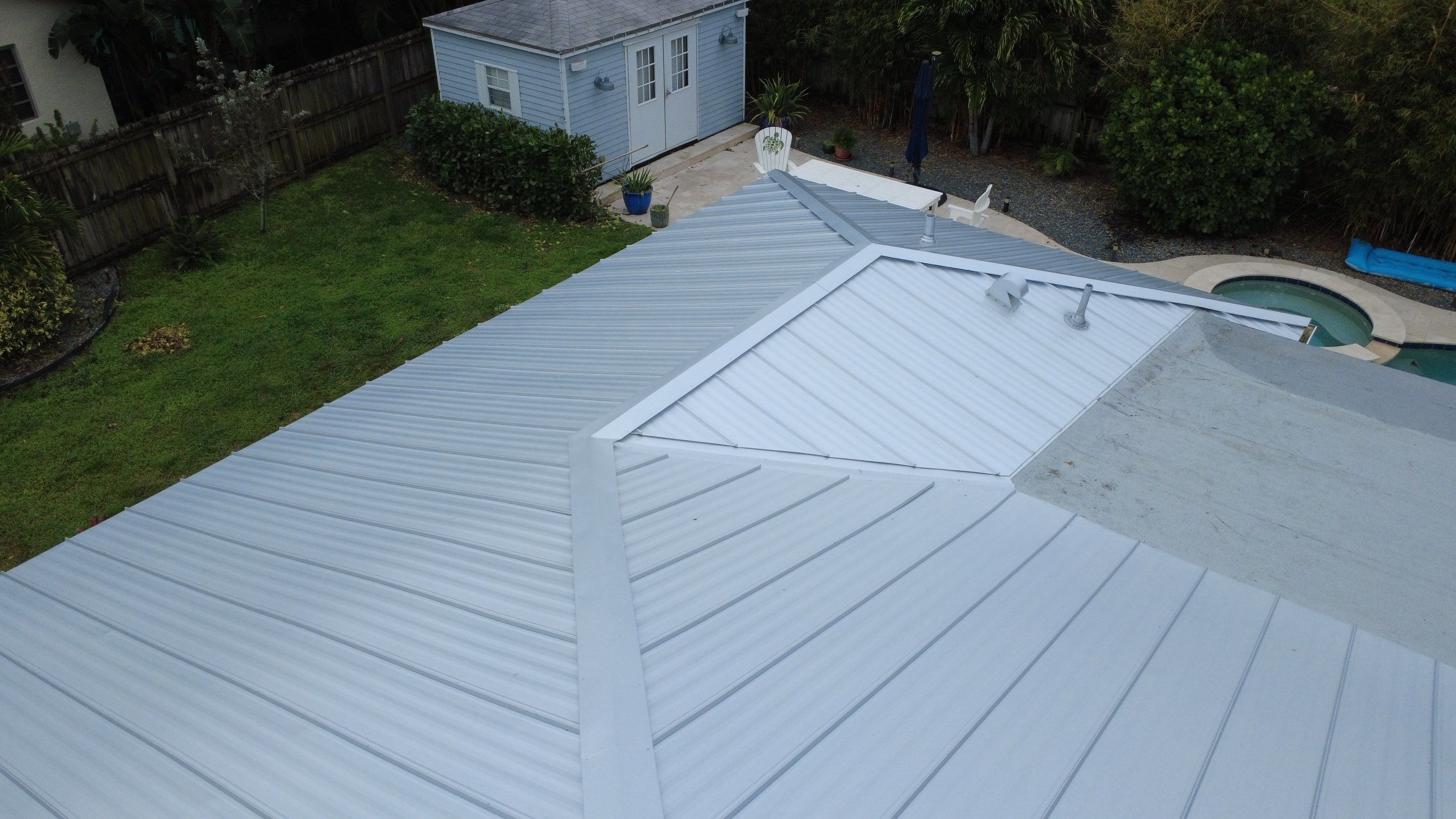 Residential Roofing Installation using 1" Nail strip metal roof by BLUES BROTHERS CONSTRUCTION CORP