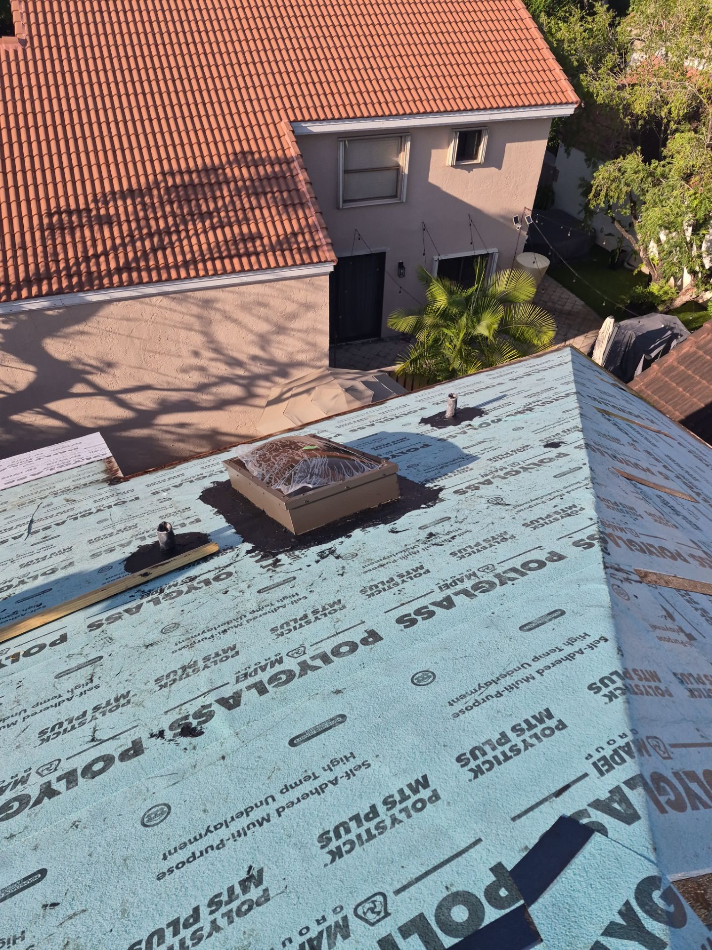 Full Tile Roof Replacement and Deck Repair in Plantation, Florida by Art's Roofing & Construction