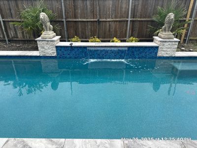 Geometric Pool with Raised Fountain Wall