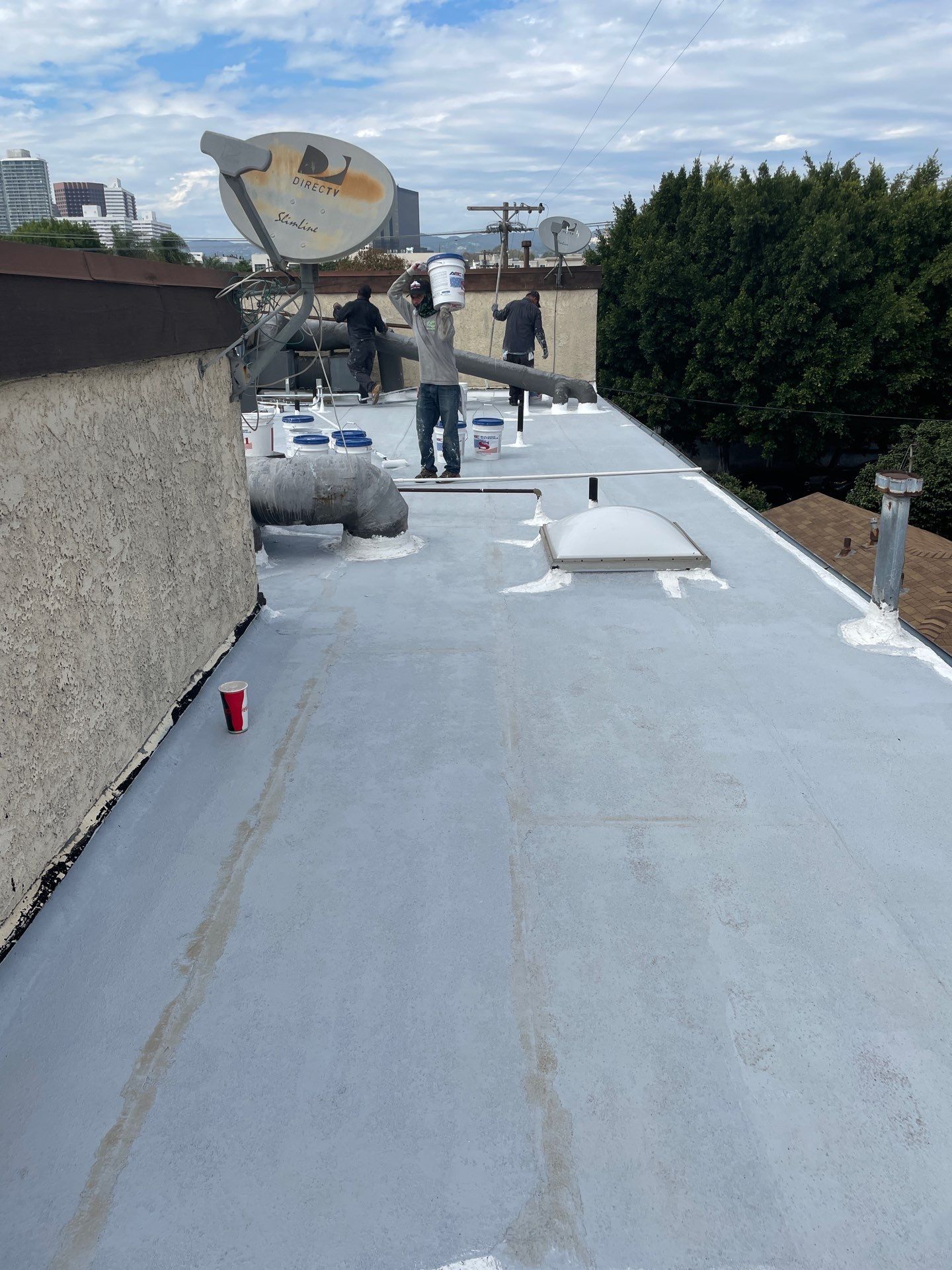 Apartment Building Silicone Coating by Hull Brothers Roofing