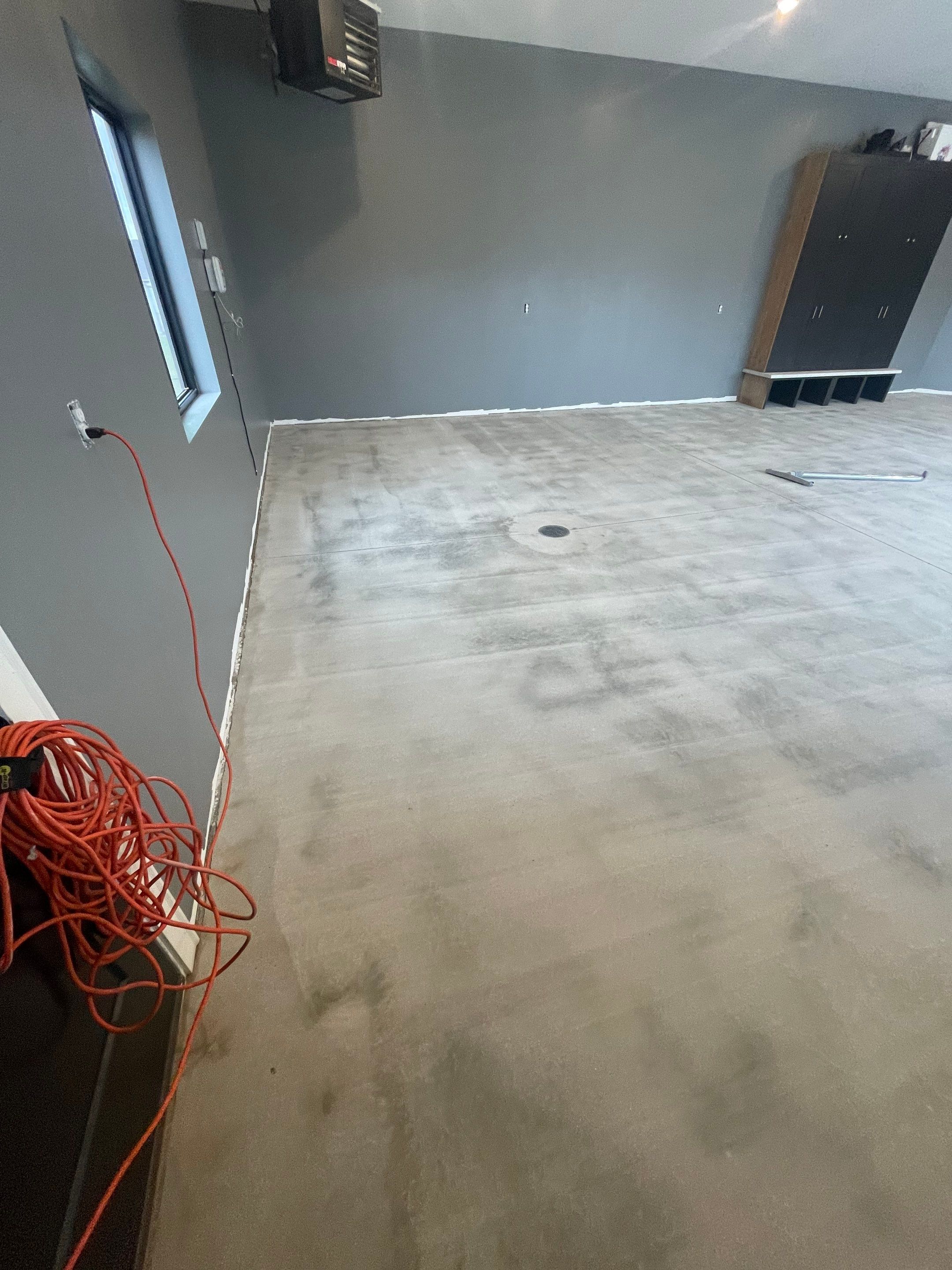 Custom Speckled Concrete Coating for Dell Rapids Garage by Select Painting, Coatings & Garage Cabinets