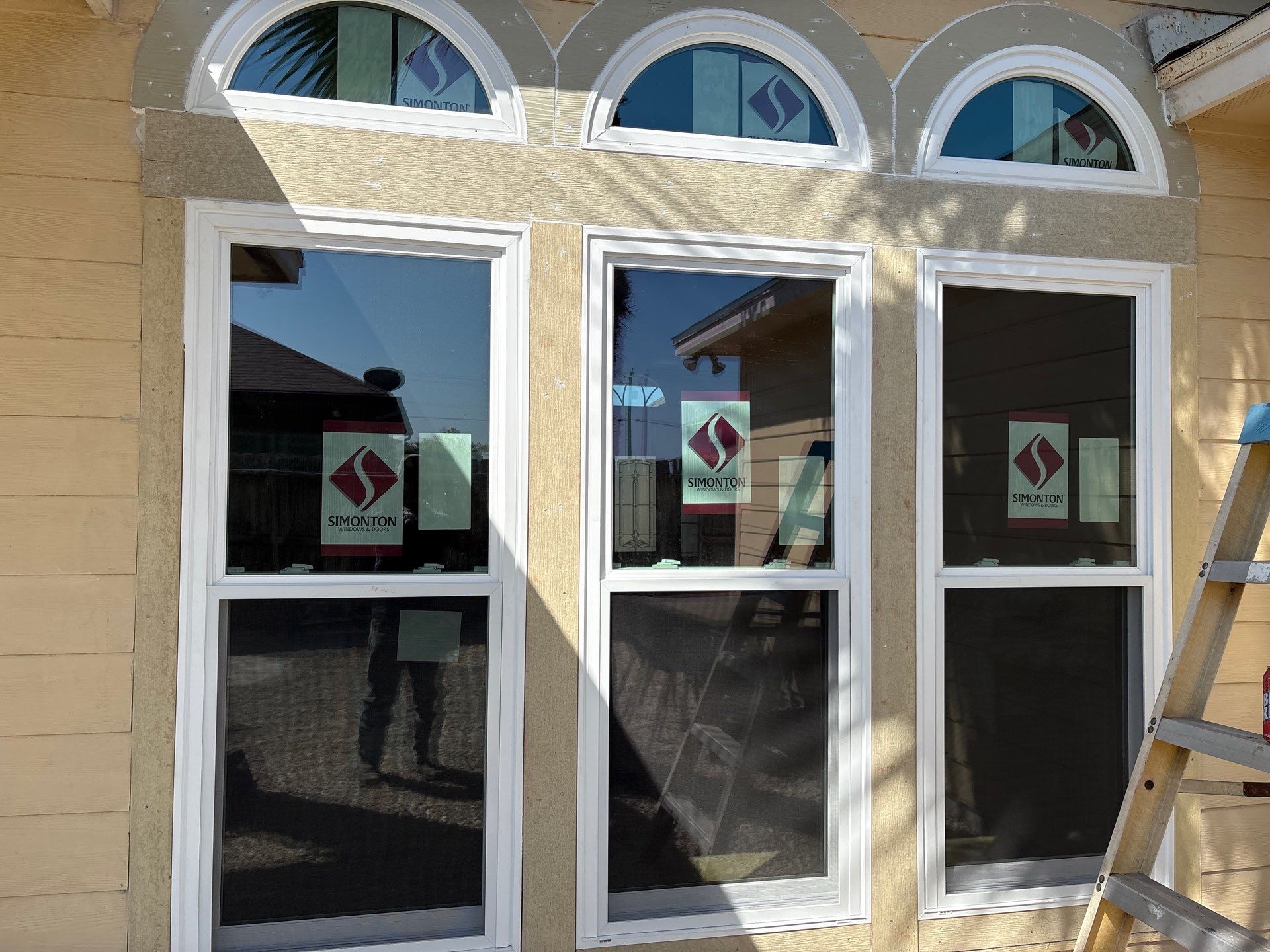Curved Trim Windows by Bayfront Roofing and Construction