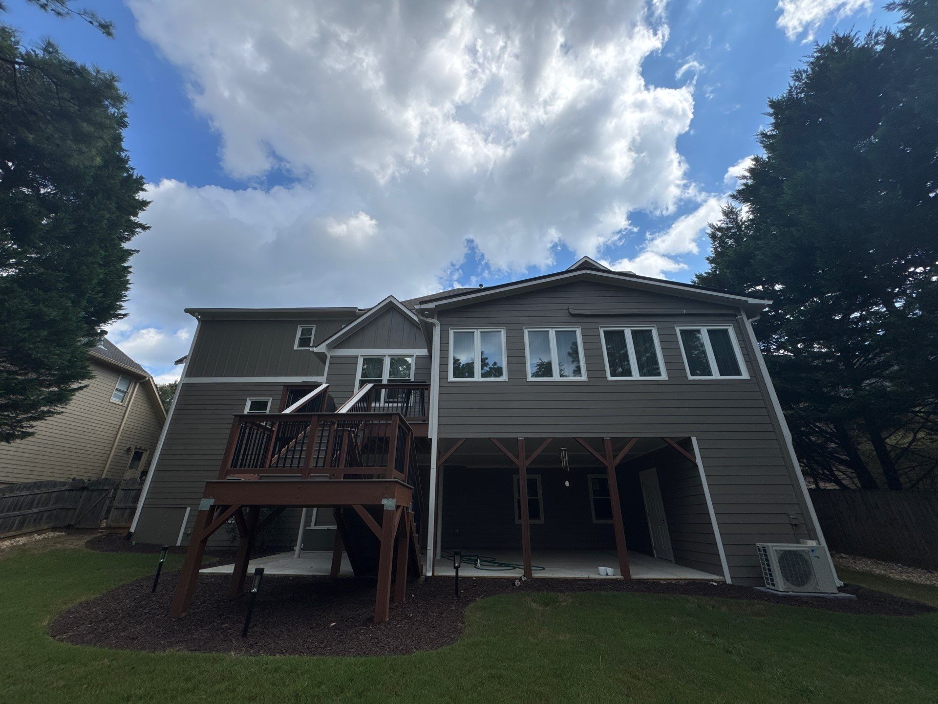 Exterior Modernization Featuring New Siding and Custom Wood Portico by Swift Home Renovations