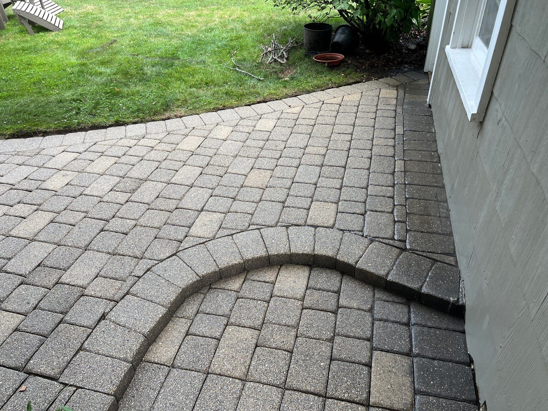 Brick paver cleaning and sealing by Northern Power Washing LLC.