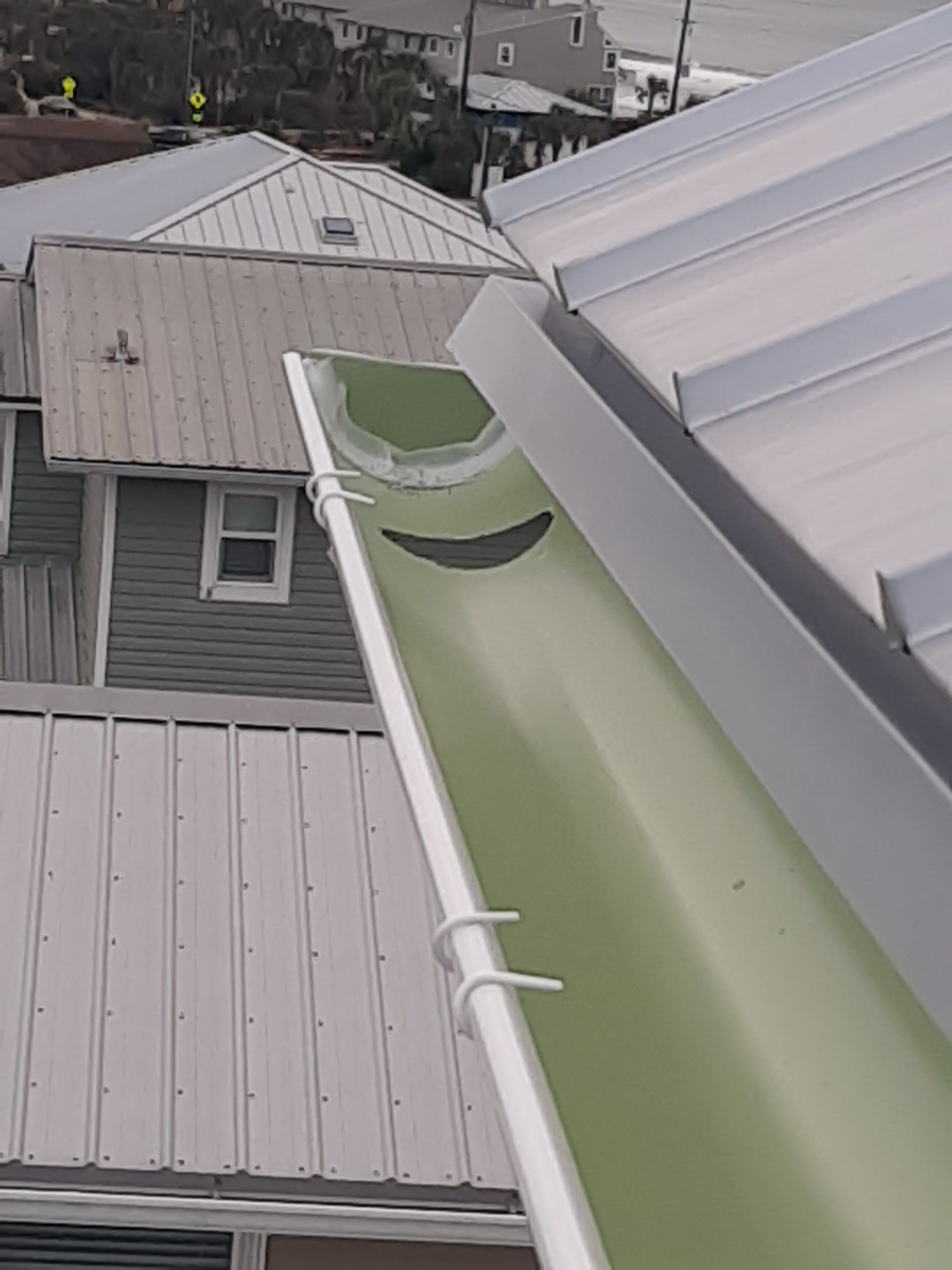 Gutter Installation Using 6 Inch Seamless Aluminum Gutters by Gutter Professors