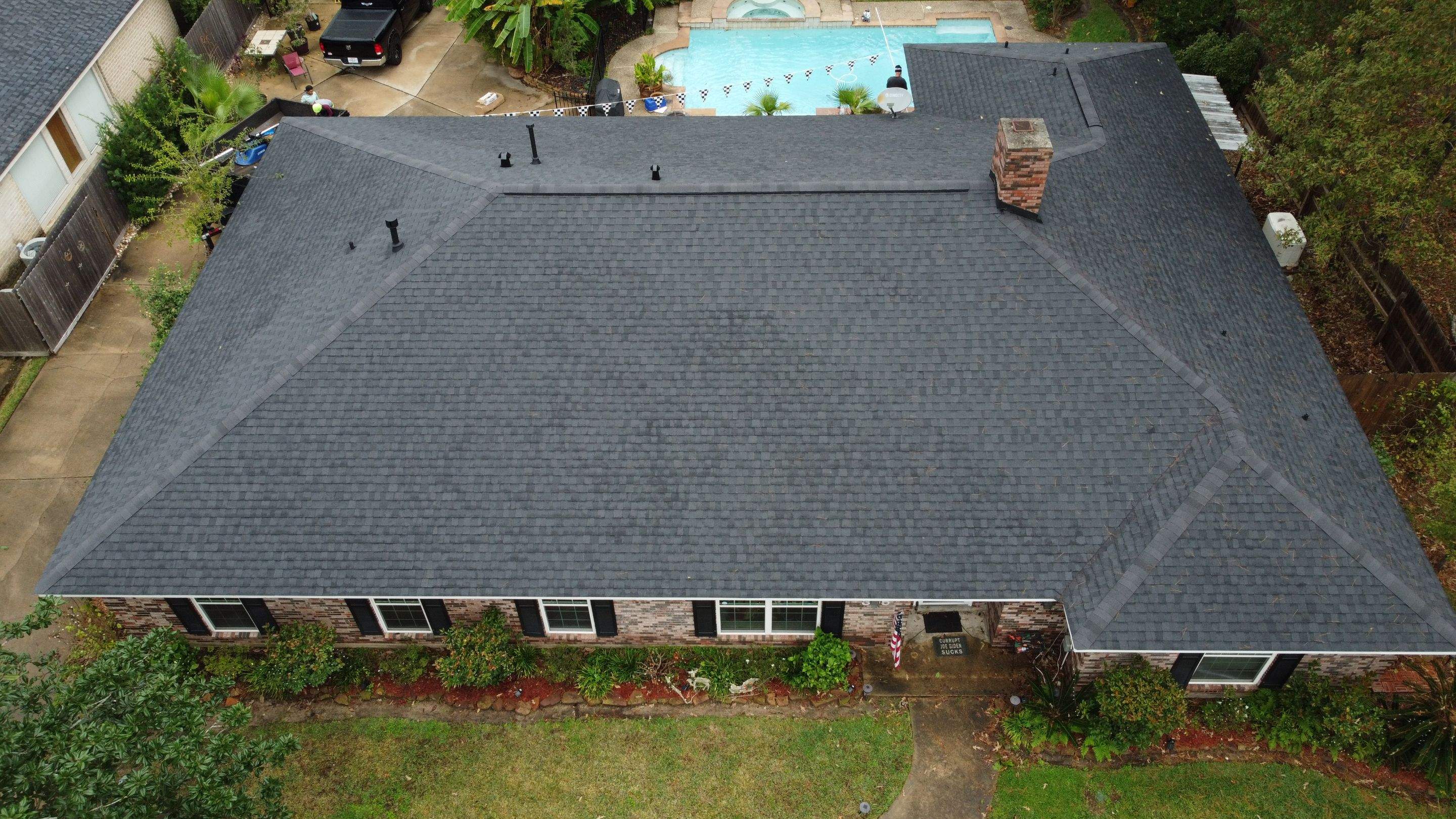 Residential Roofing Installation using Certainteed Landmark Moire Black by Galvan Roofing and Construction