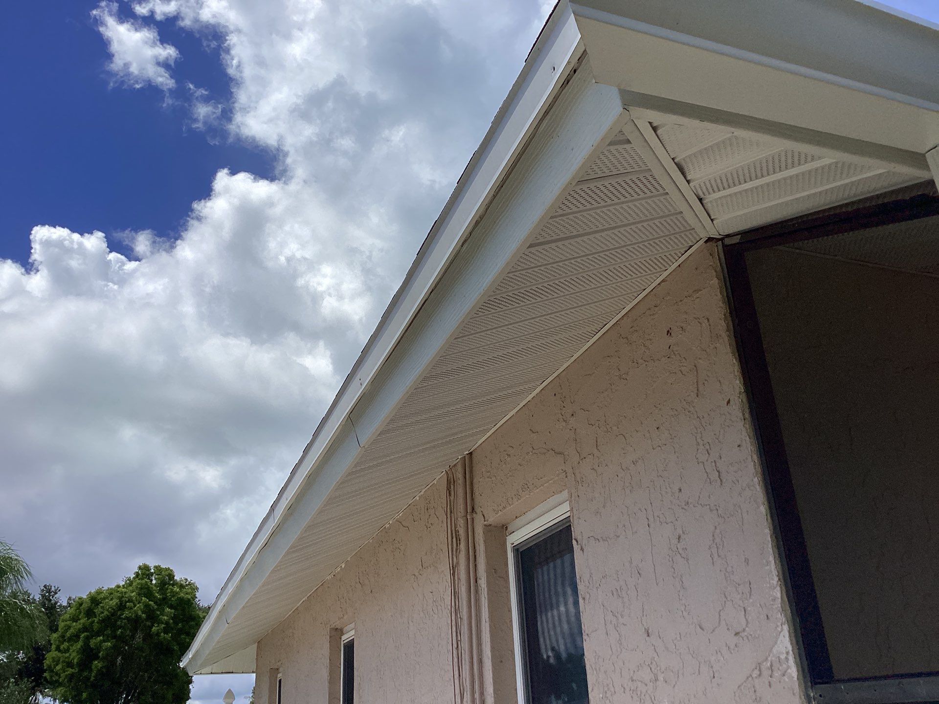 White Seamless Gutters and Splash Guards in Fort Myers FL by Gutter Professor by Gutter Professors