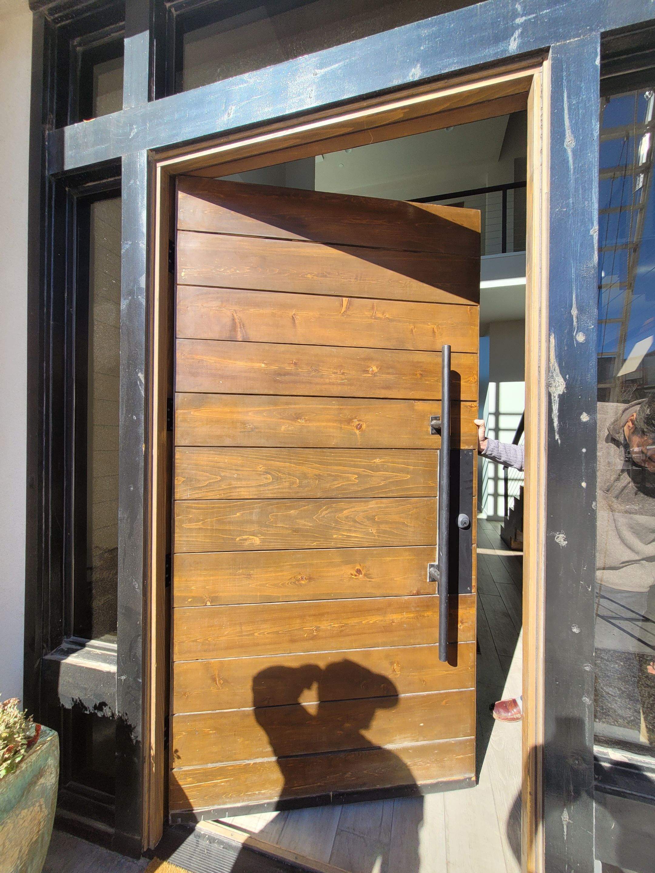 Exterior Wood Staining and Composite Decking Installation by Regal Renovate