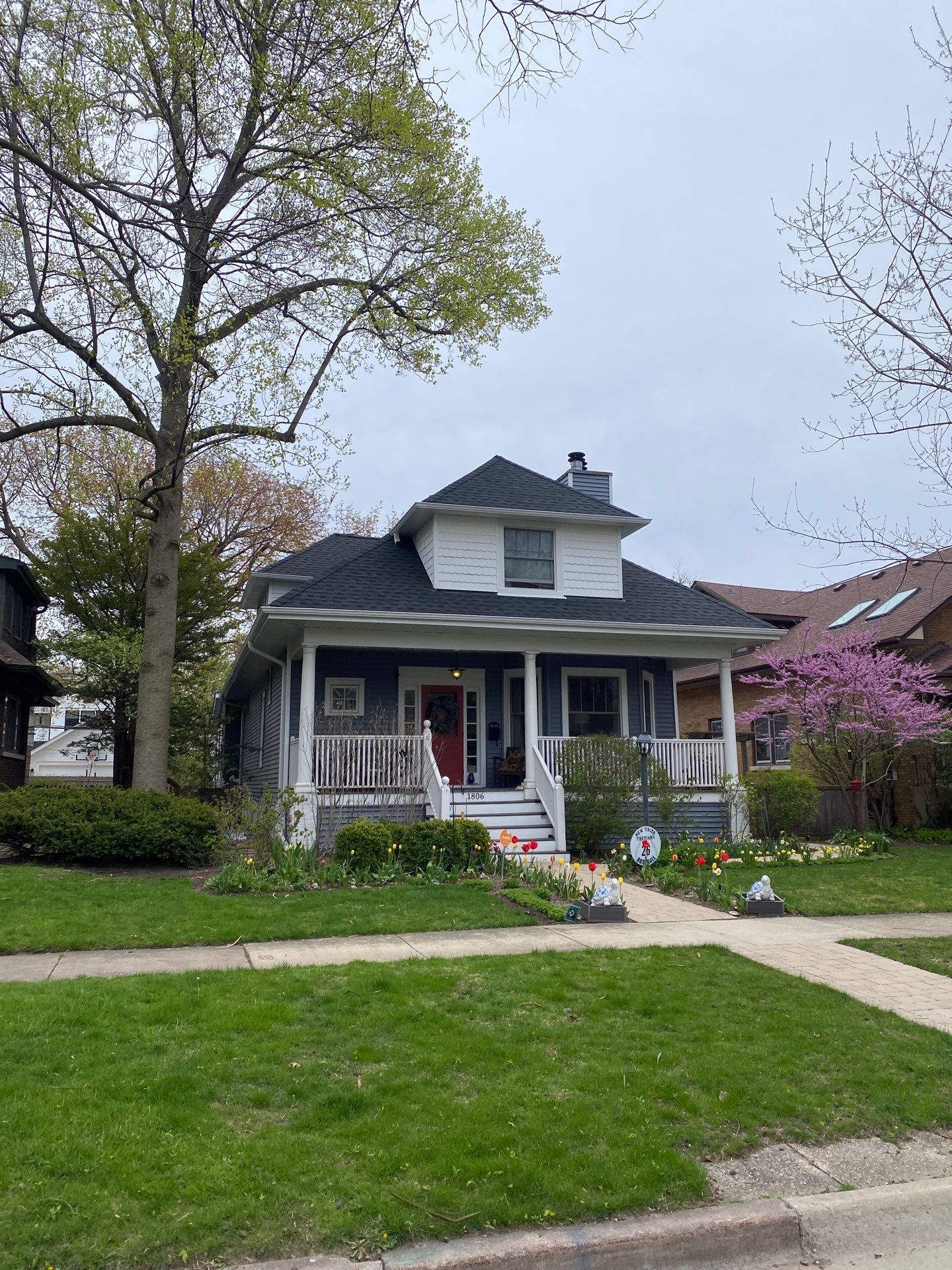 Asphalt Roof, Vinyl Siding, and Aluminum Gutter Replacement by Custom Installations