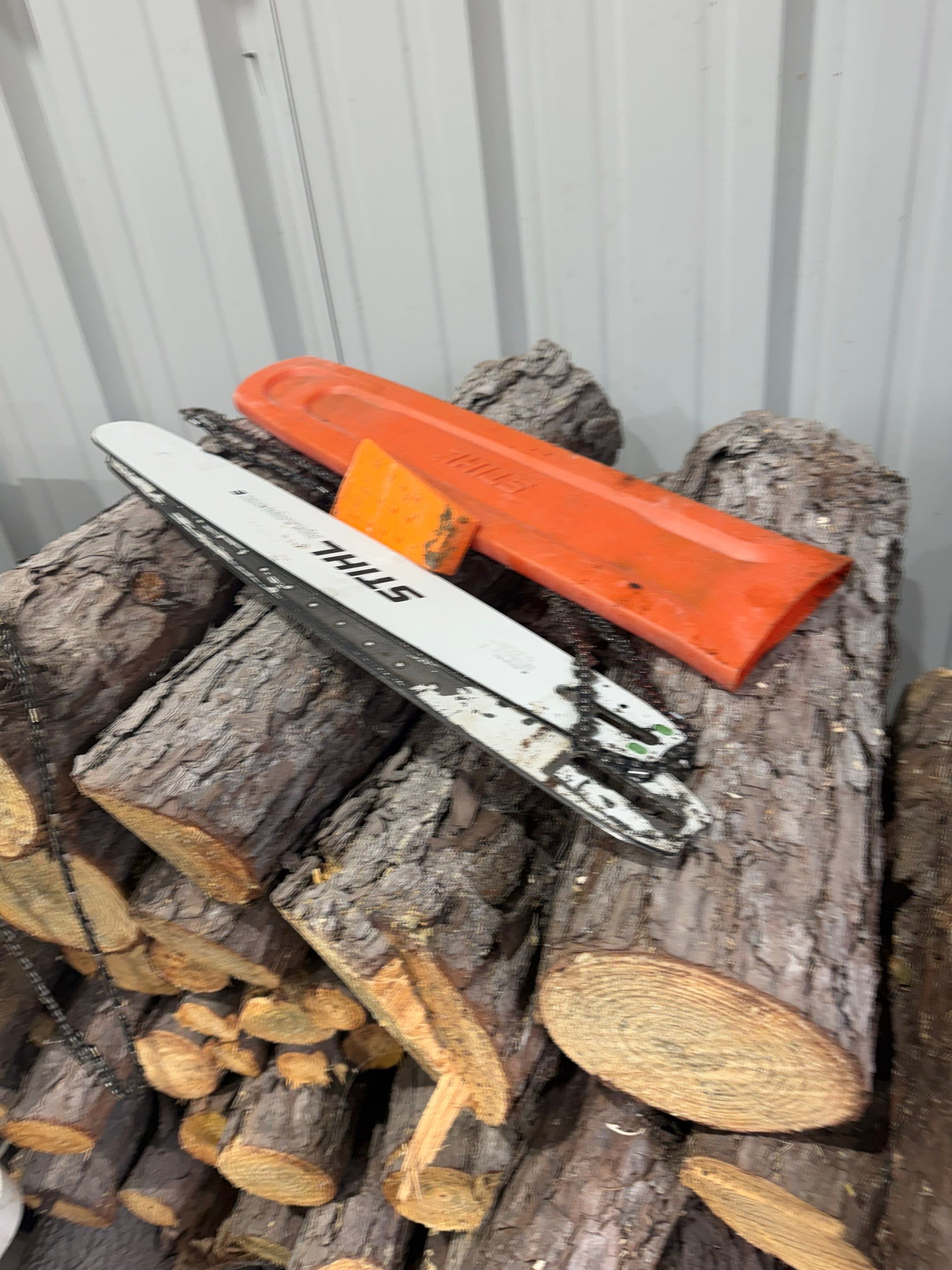 Saw Stuck In A Tree by Harden Enterprise Services LLC