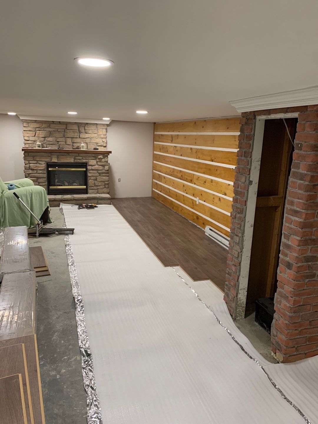Basement finishing after flood by Eco-Nature Construction Inc.