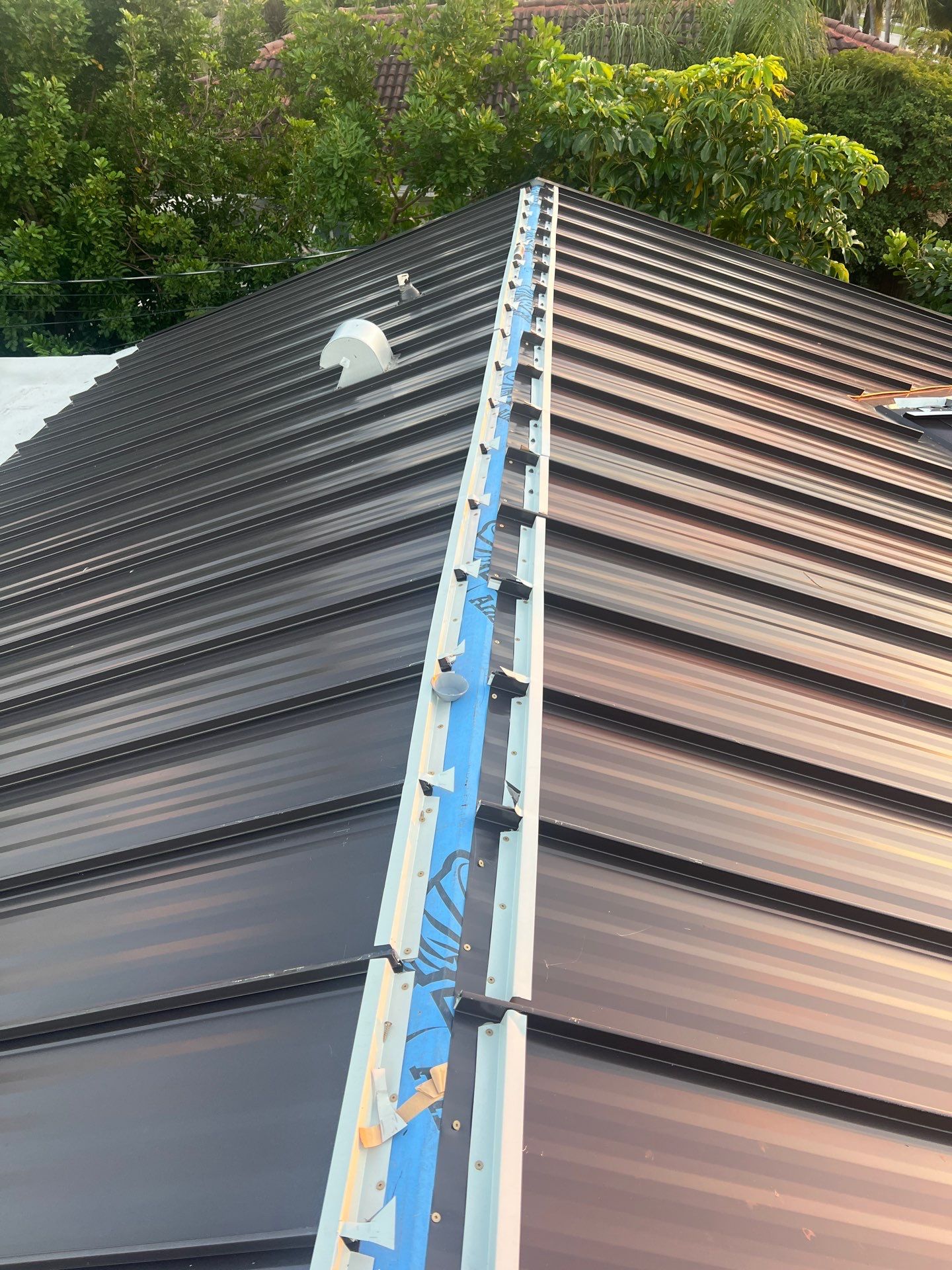 Residential Roofing Installation using 1" Nail strip metal roof by BLUES BROTHERS ROOFING