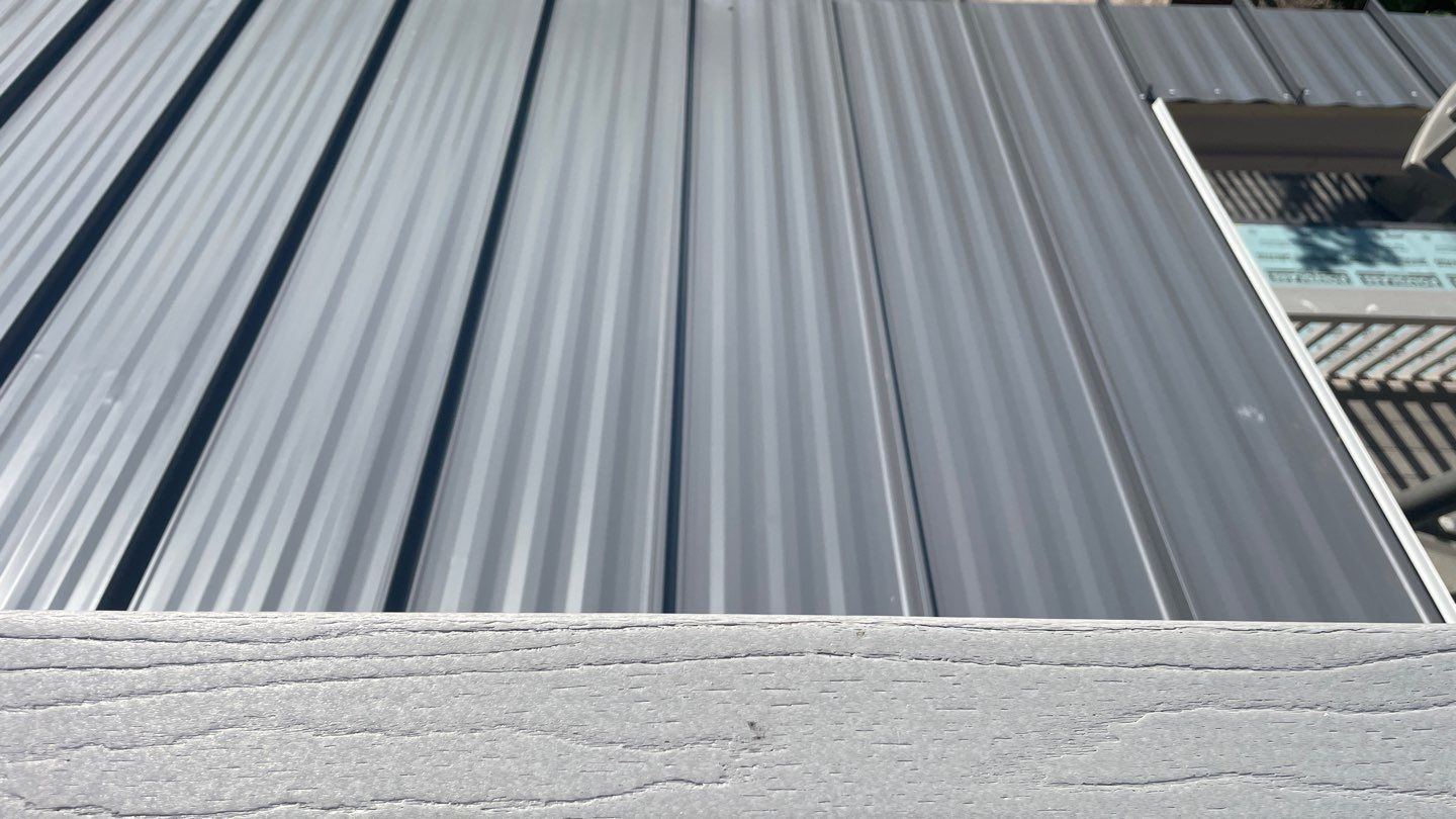 Residential Roofing Installation using Gulf Coast Metals Gulf Seam Panels by Four Peaks Roofing