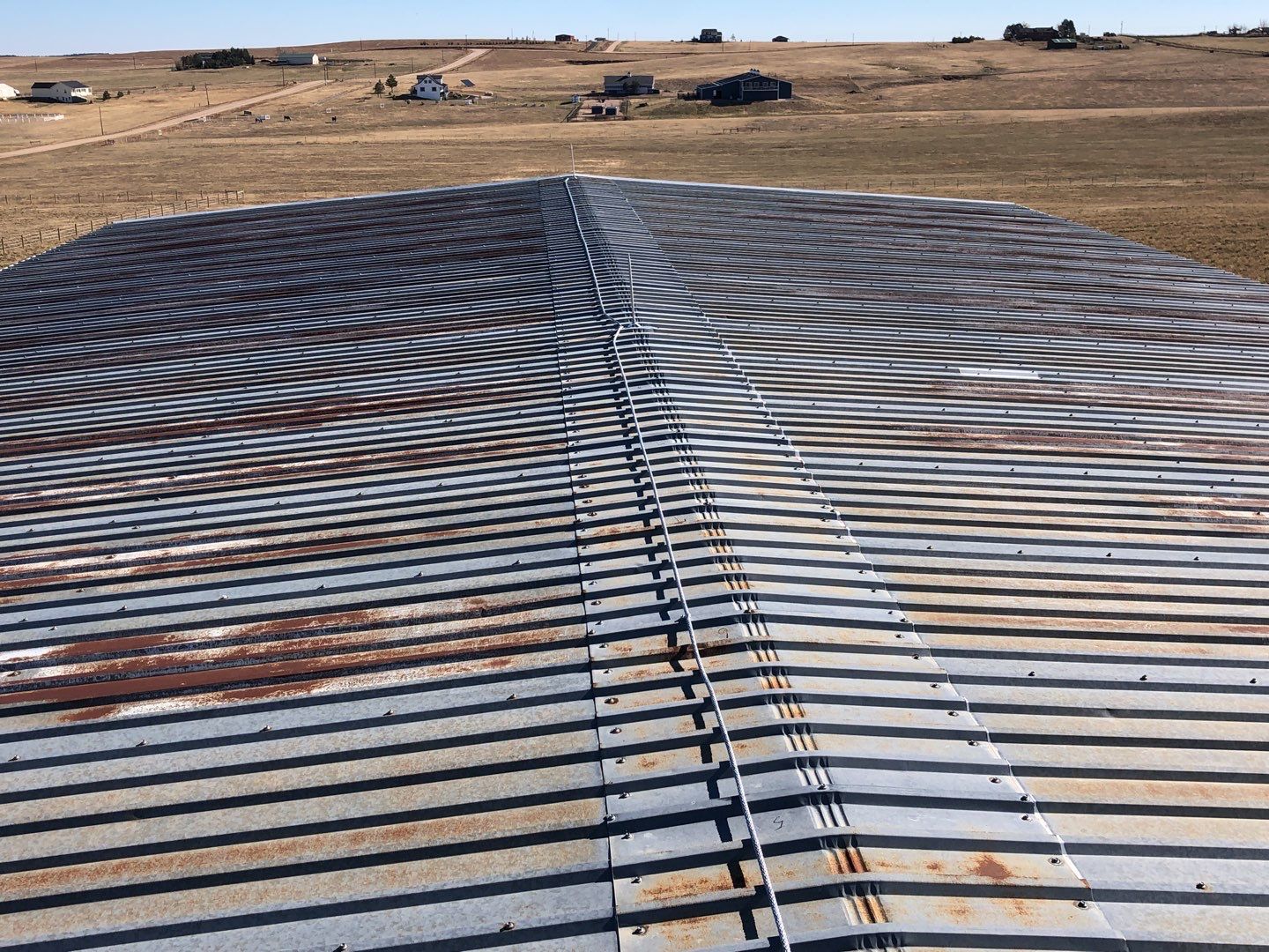 Residential Roofing Installation using Metal roofing by American Roofing & Construction LLC