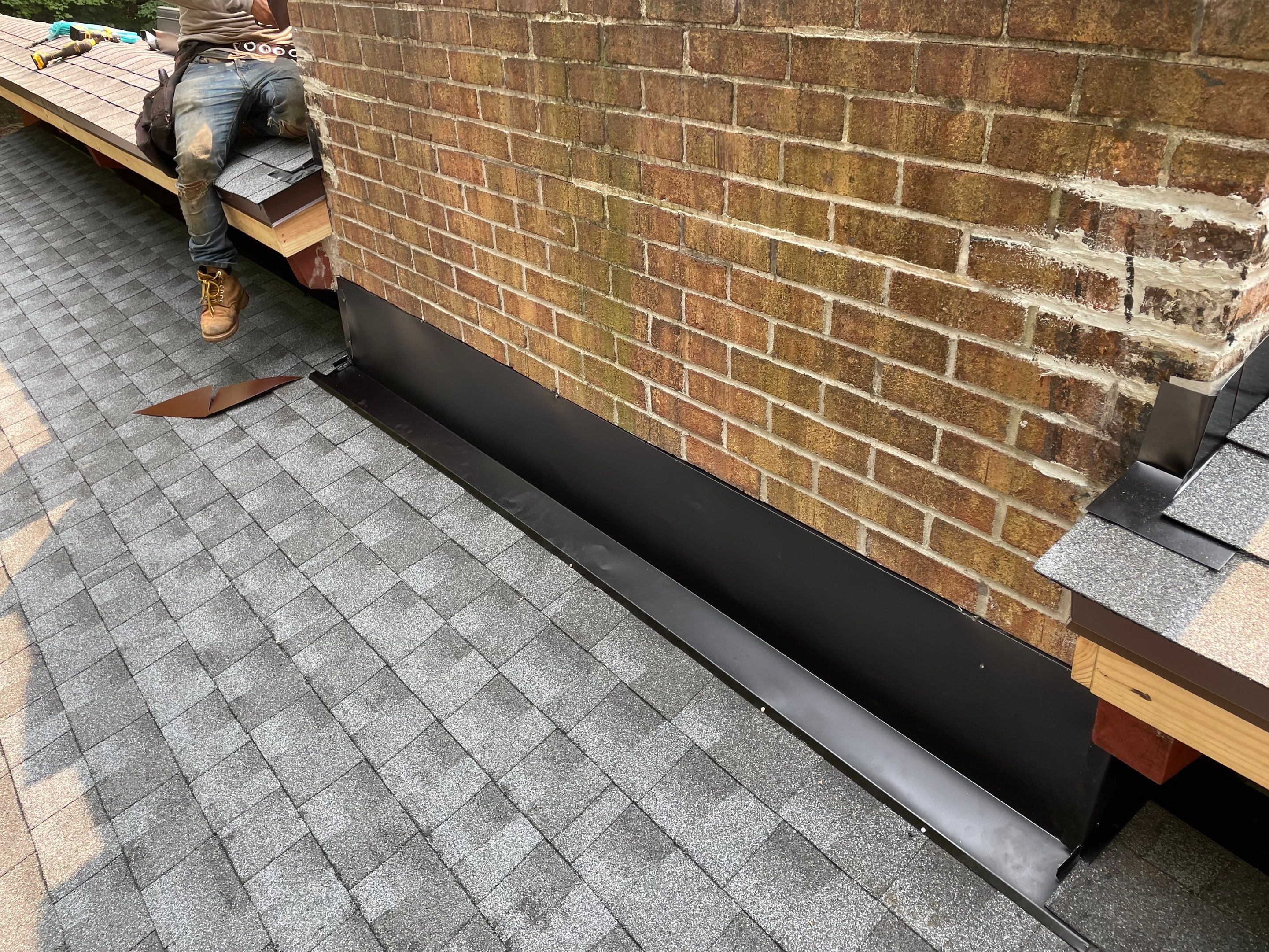 Deckhouse Roof Replacement by American Home Contractors