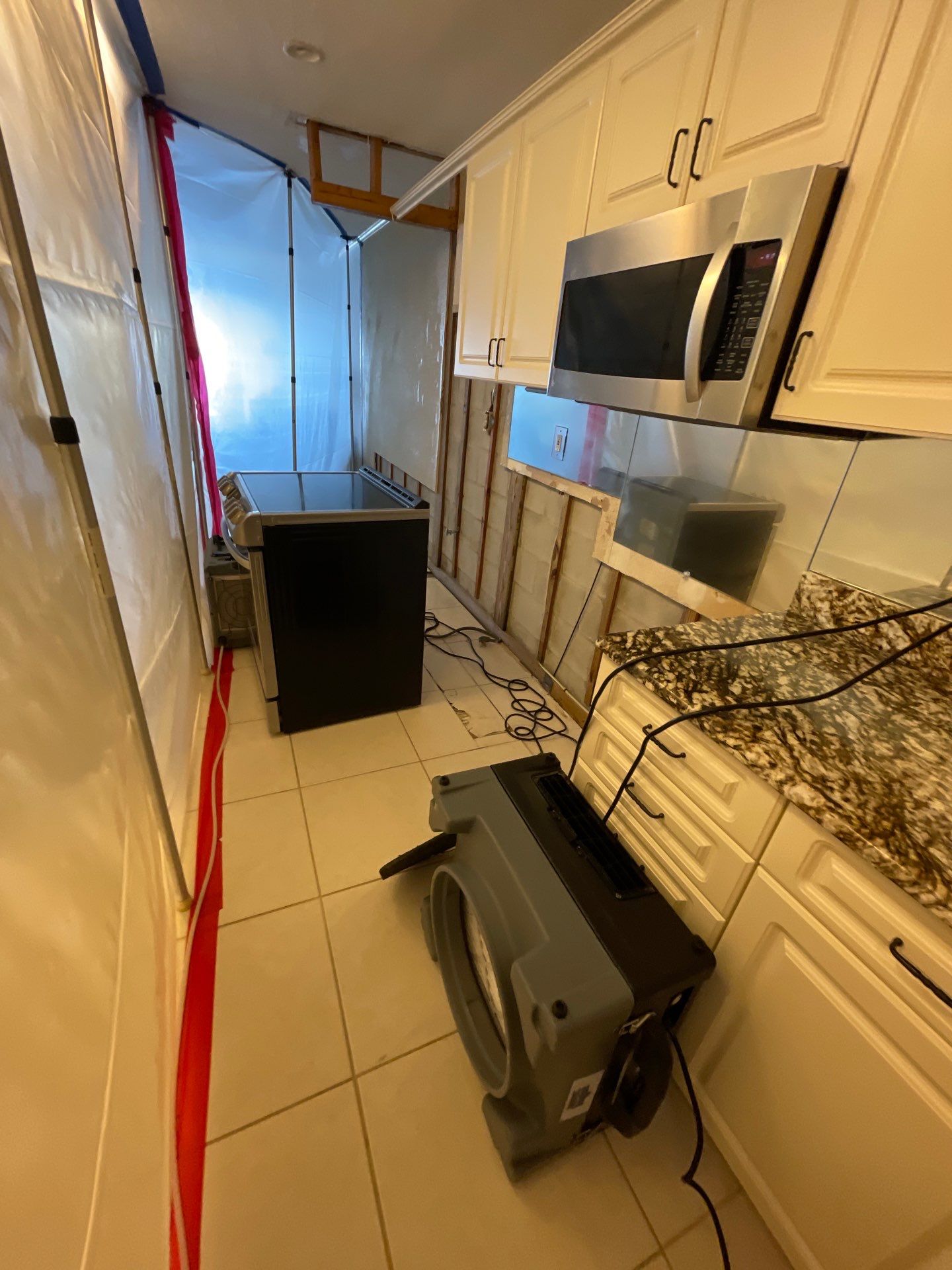 Mold remediation and rebuild of kitchen and living areas by Bay Coast Restoration 