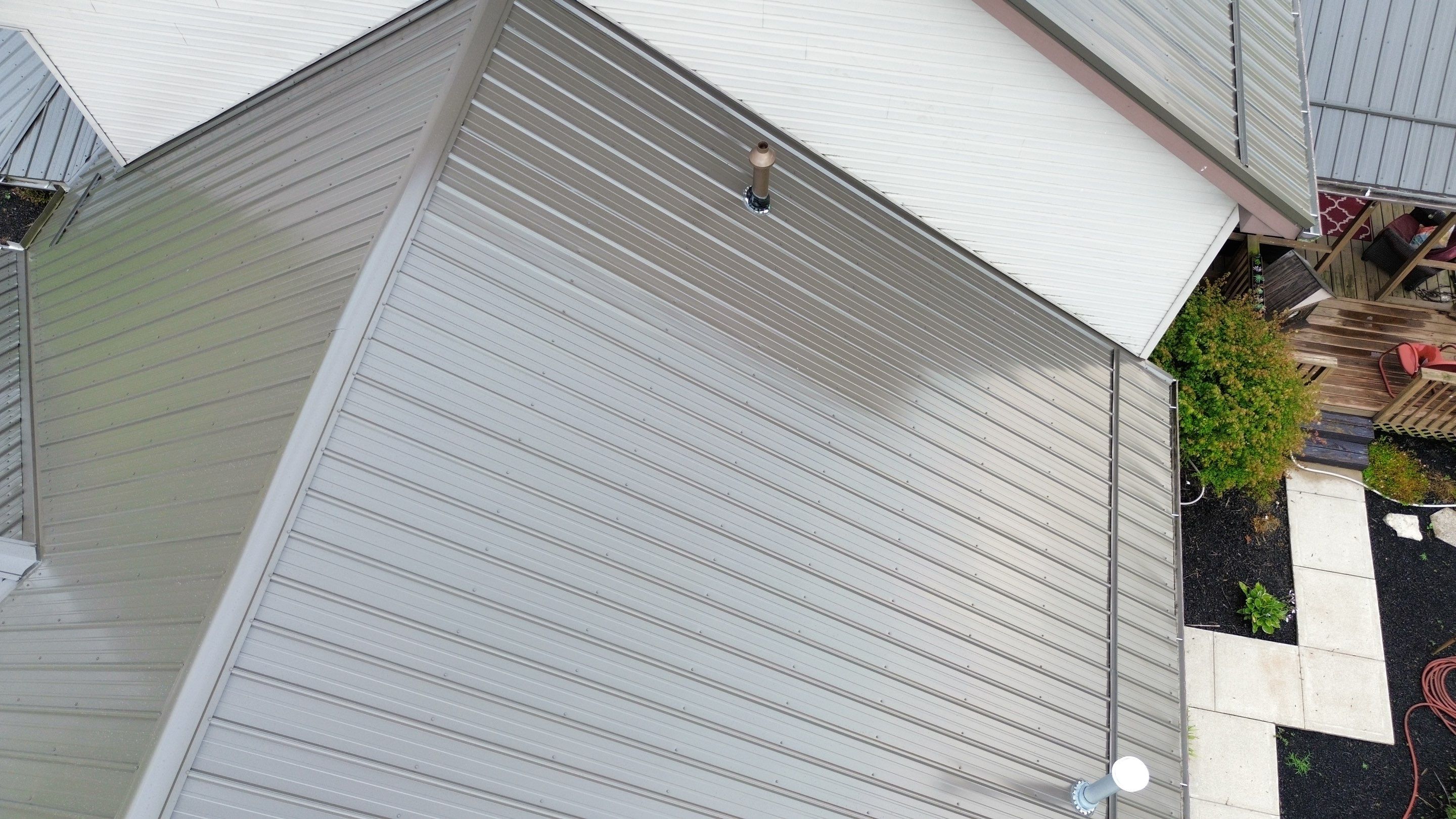 Residential Roofing Installation using Performance Panel Metal - Burnished Slate by RoofX 