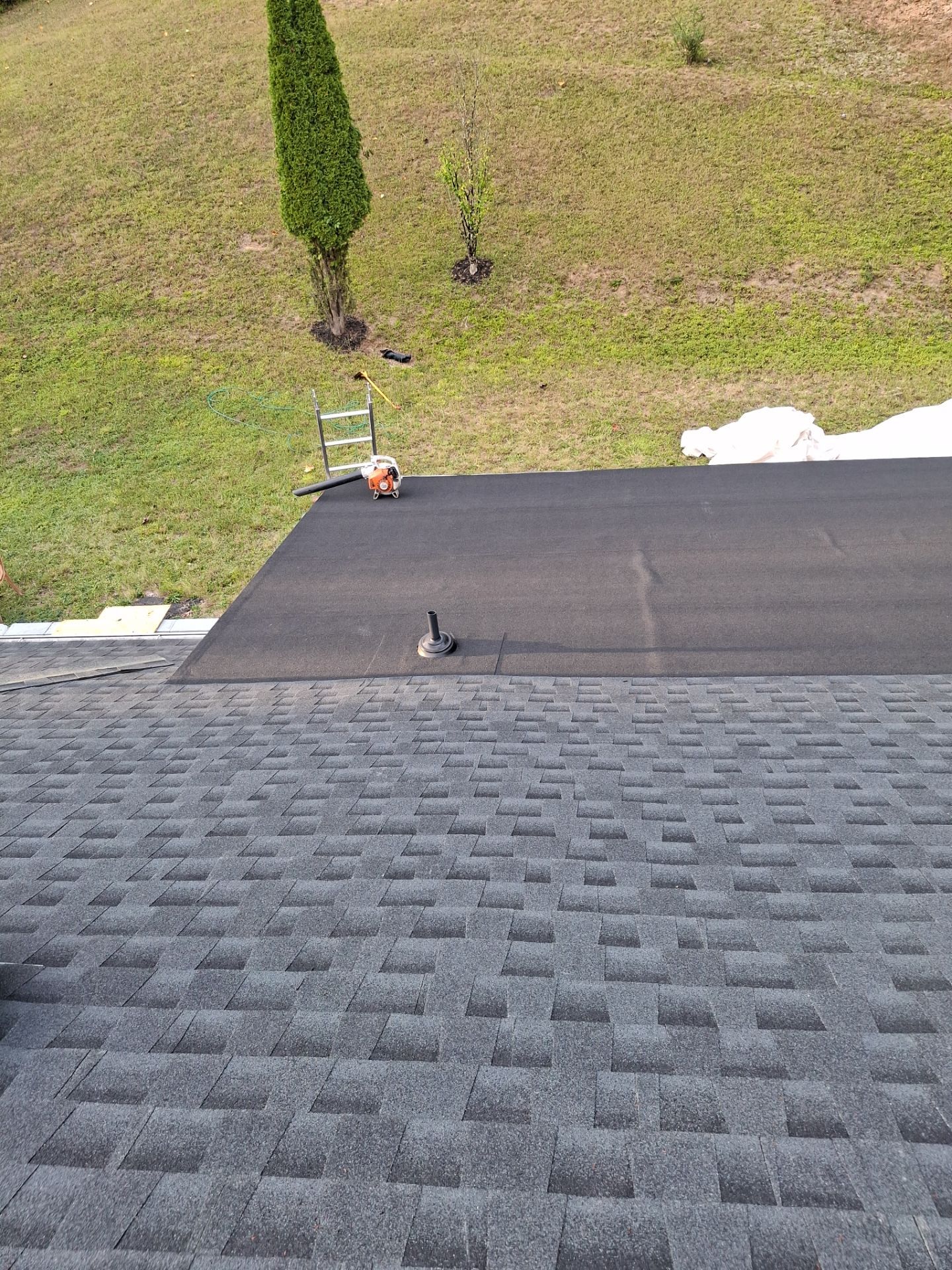 Residential Roofing Installation using GAF Timberline HDZ Charcoal by Rainstoppers Roofing