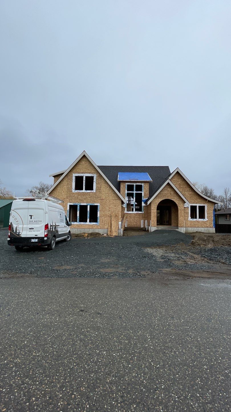 Residential Roofing Installation using Malarky Vista Shingles and Prolok Metal  by Top Notch Roofing Inc