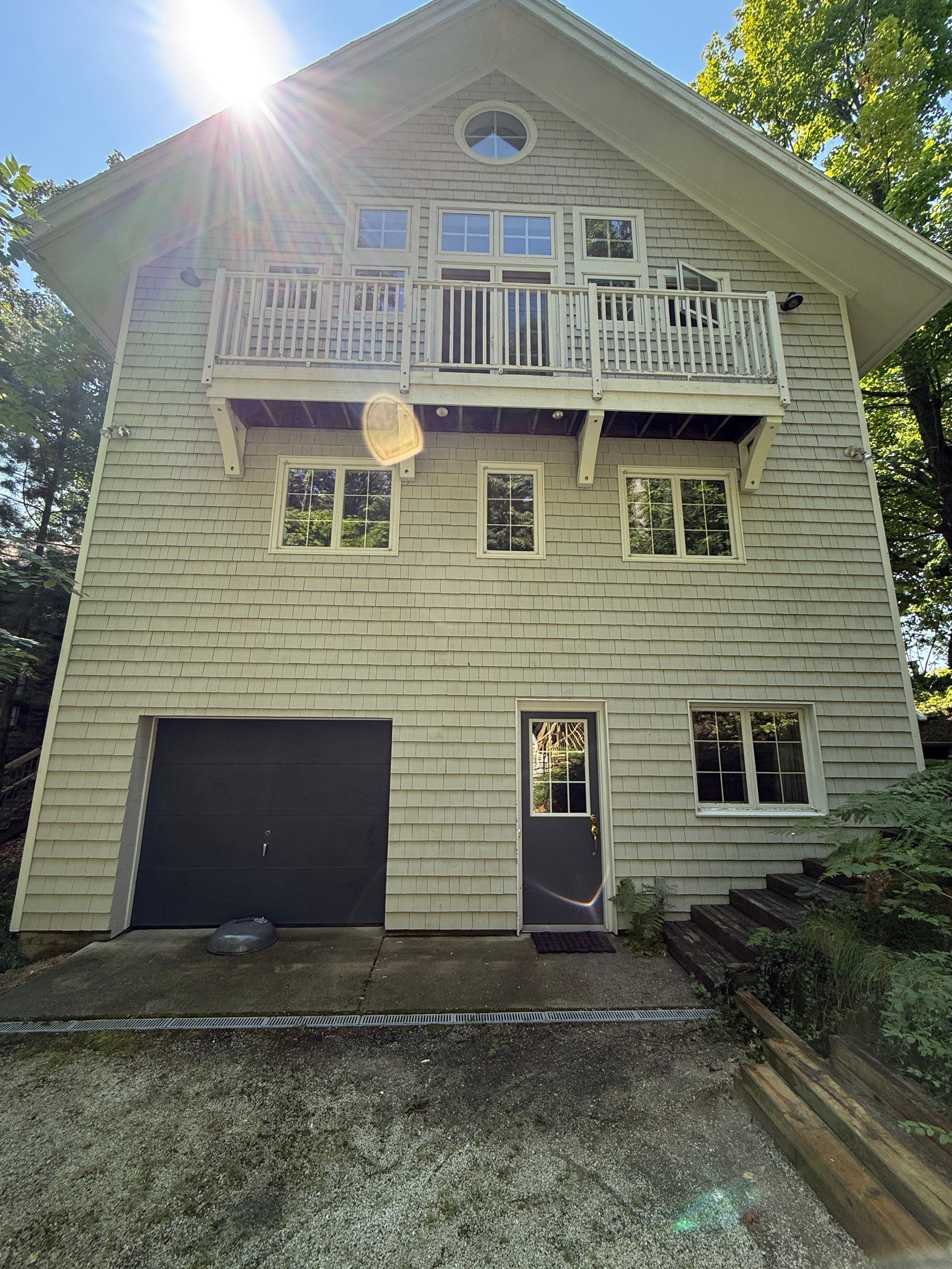 Lakefront Deck Pressure Washing, Exterior Wood Staining, and Painting in West Olive MI by Gordon Painting