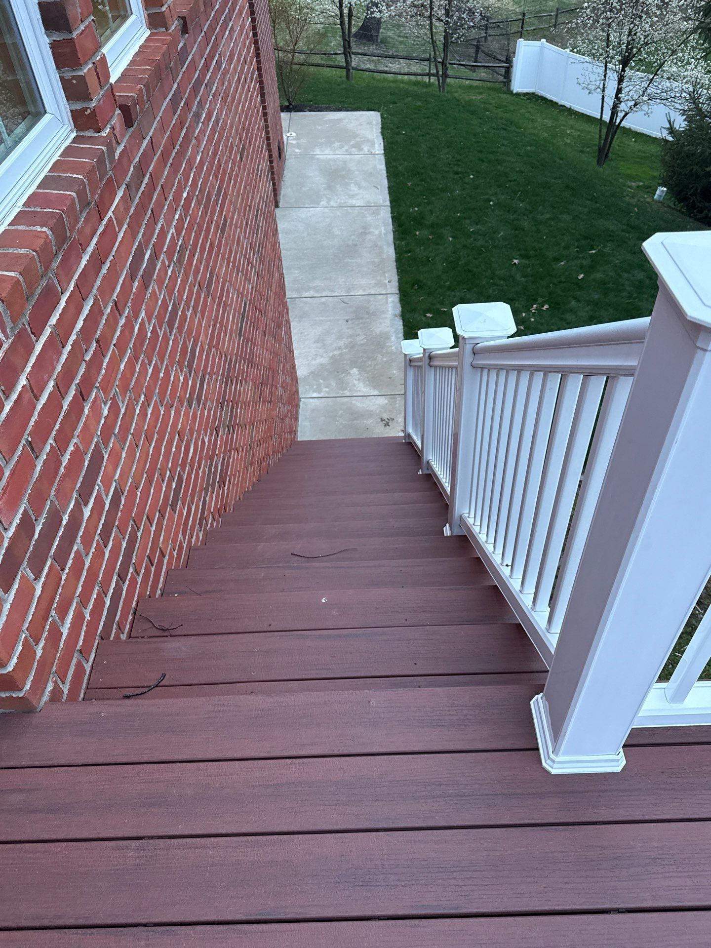Deck extension  by Cousins Roofing Siding & Decks