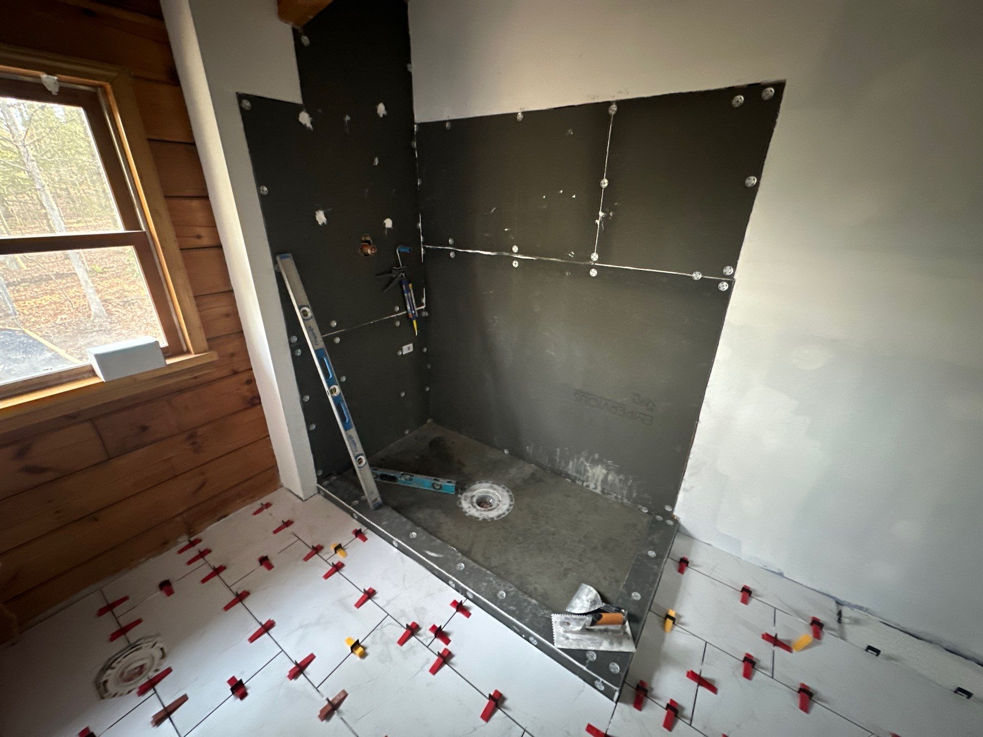 Brandt Double Bathroom Remodel by Integrity Tile and Home LLC