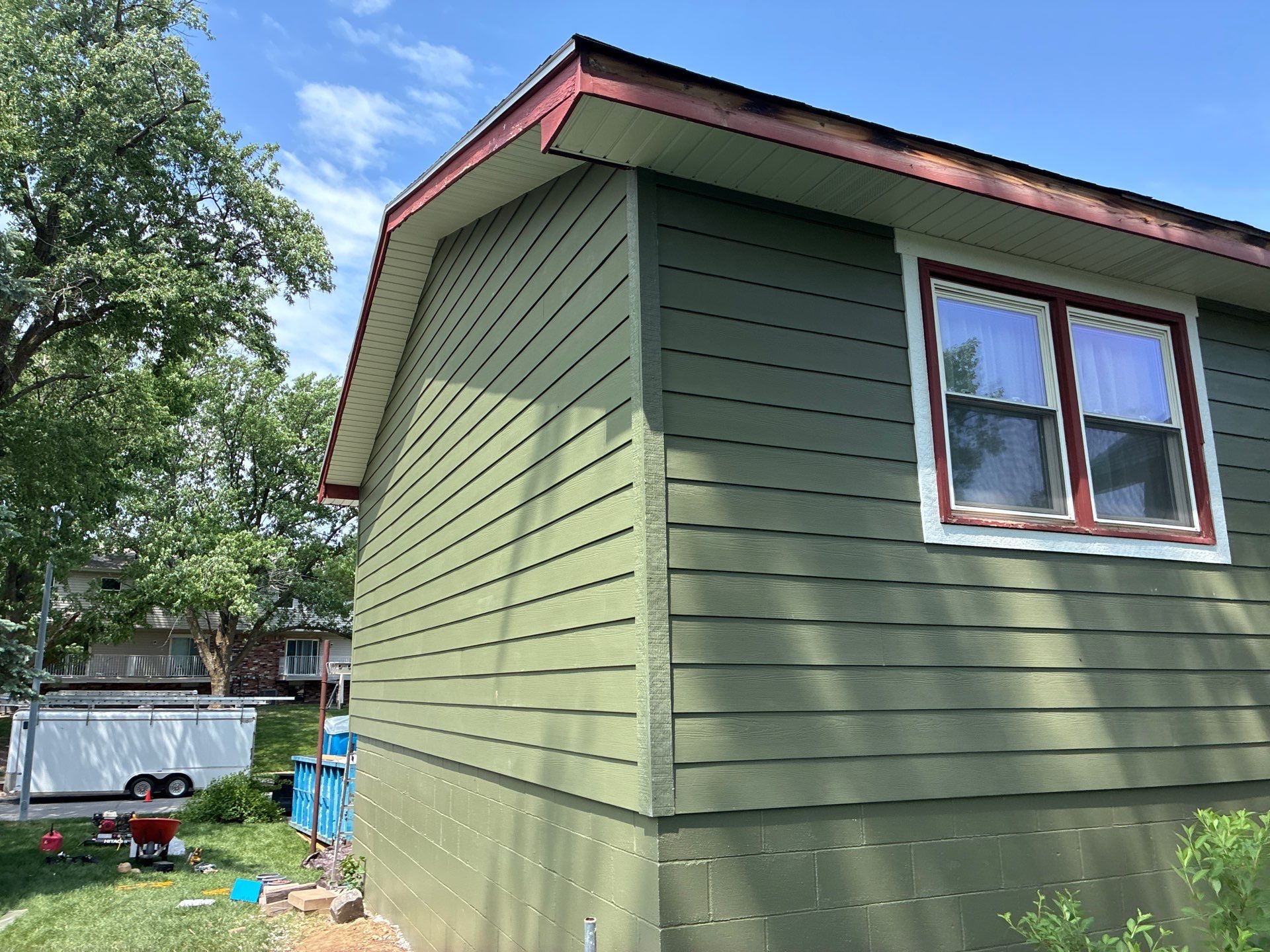 James Hardie Siding Replacement in Omaha with Mountain Sage Finish by Carps Complete Exteriors