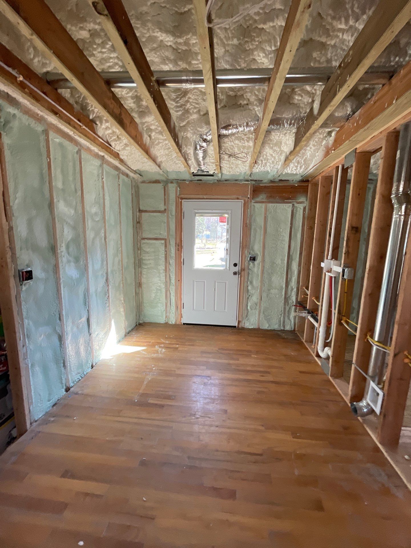 Basement Exterior Walls using Closed Cell Spray Foam by NYS Foam & Energy