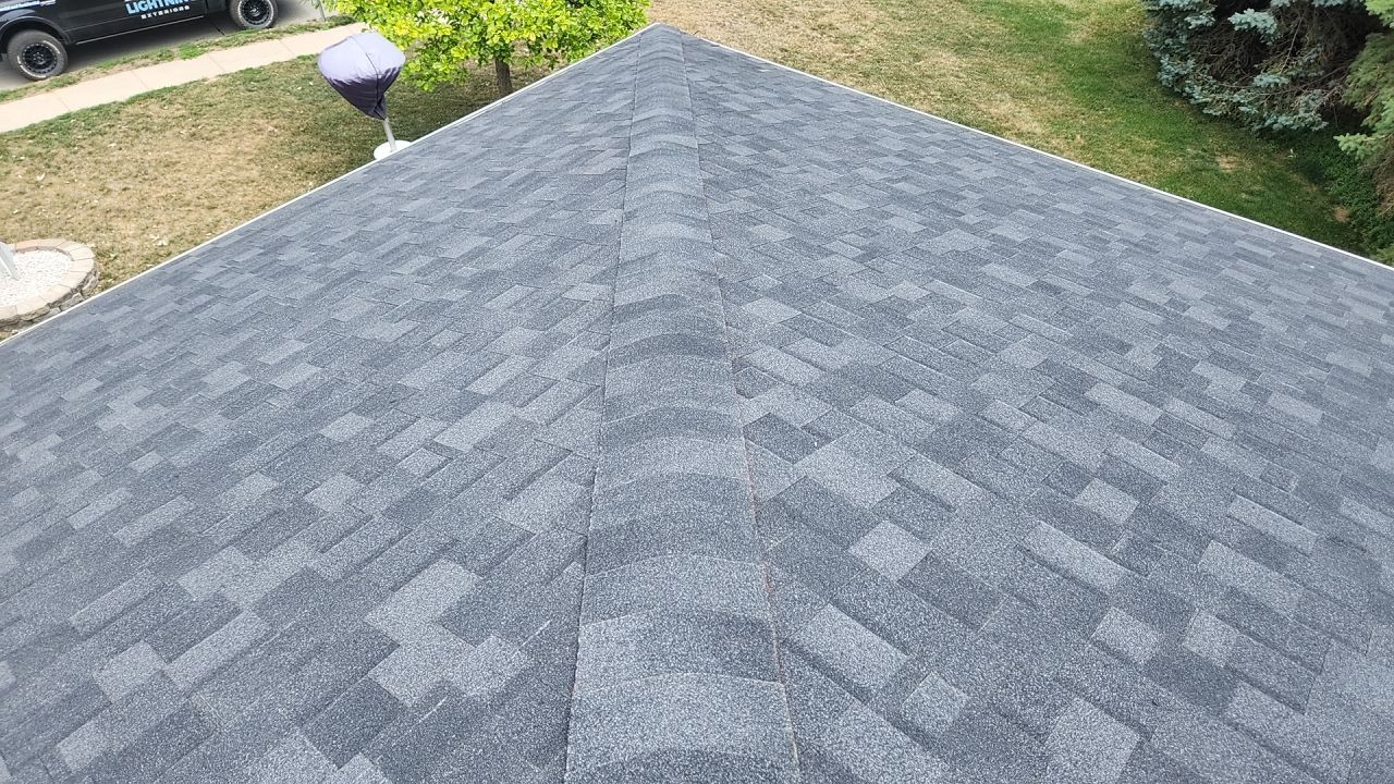 Roofing / Siding / Gutters using IKO Dynasty Granite Black / Norandex Siding by Lightning Exteriors
