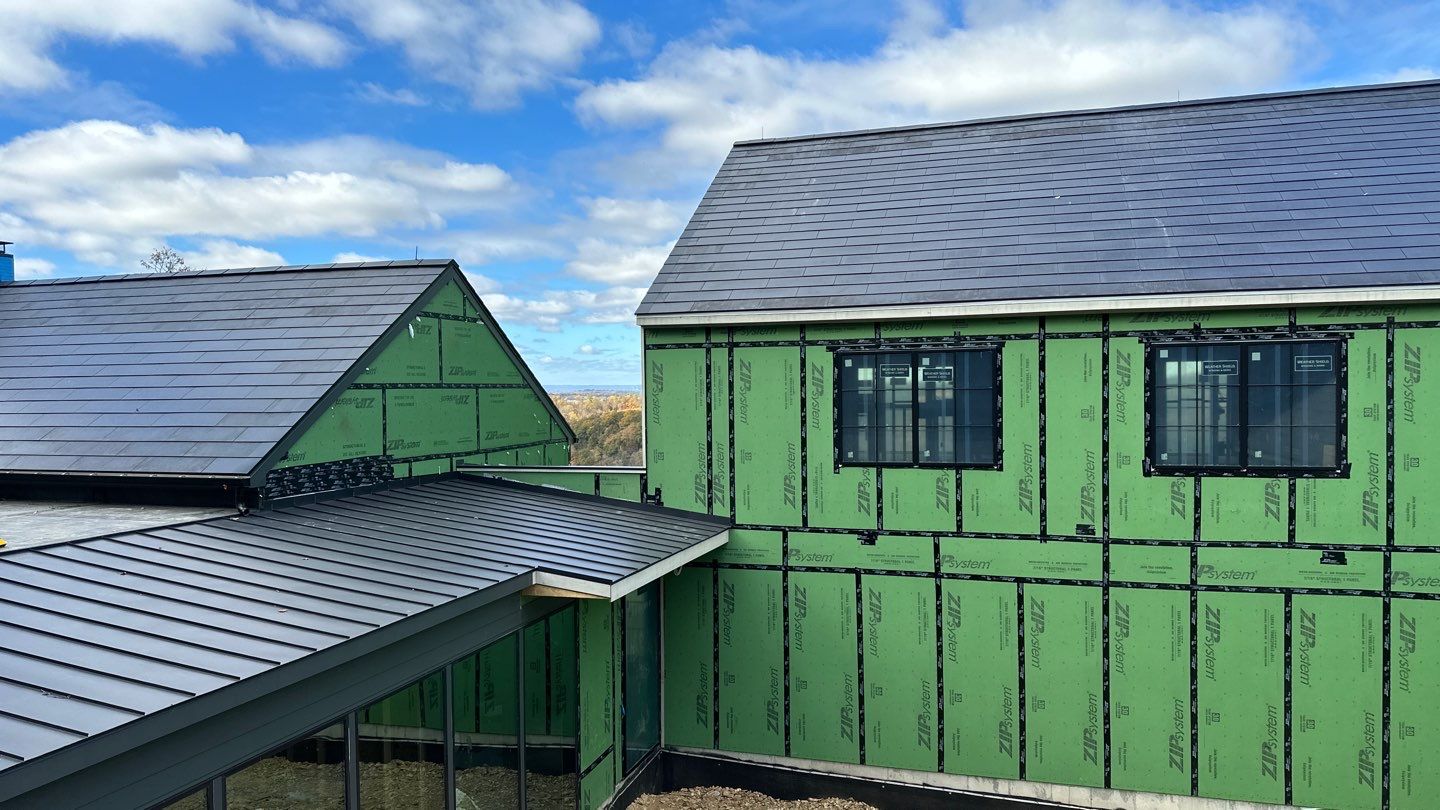 Roof Installation using Tesla Solar Roof V3 by American Home Contractors