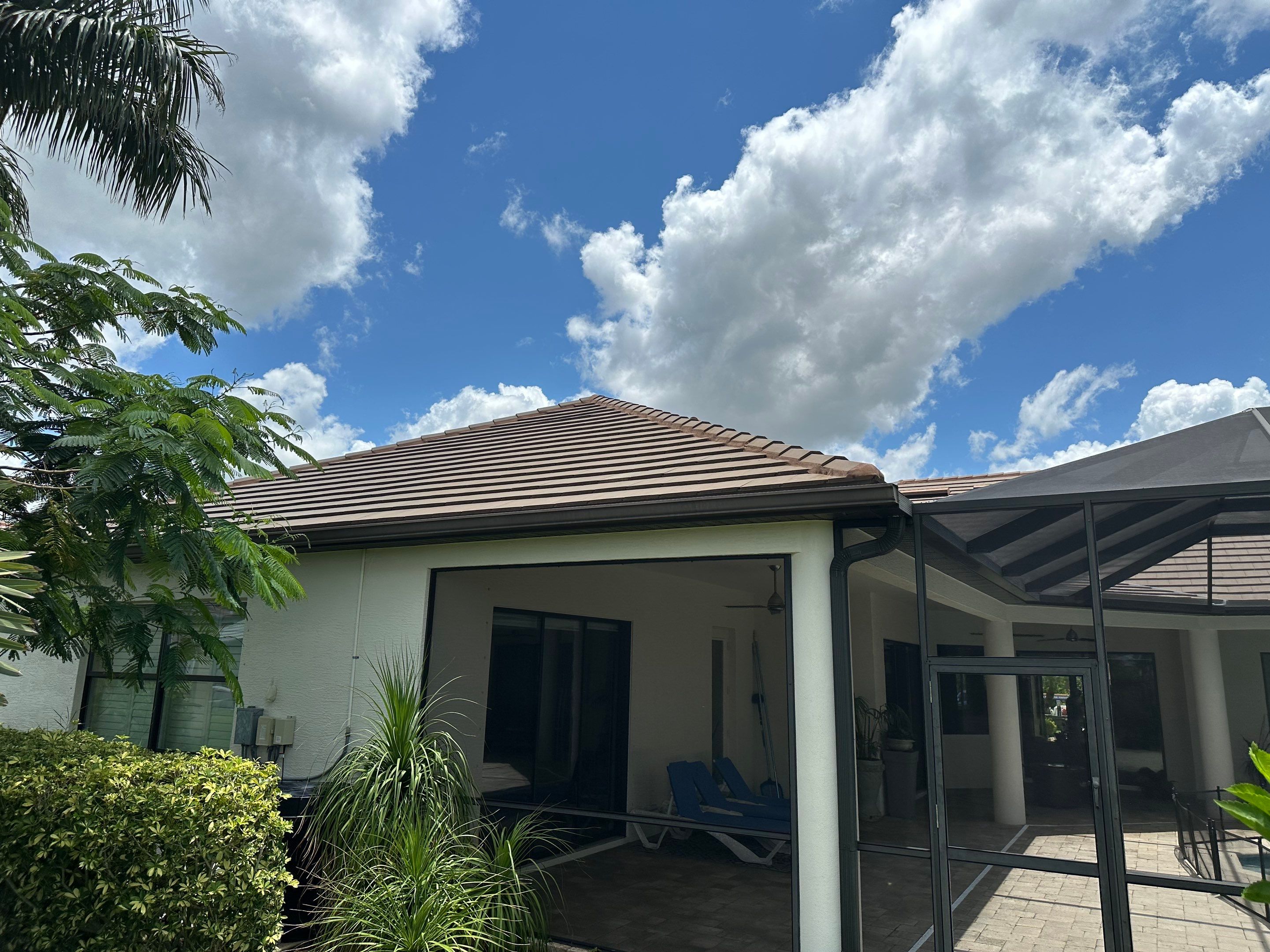 Flat Tile Roof Cleaning, House Wash & Sidewalk Cleaning in Enclave at Country Meadows, Bradenton, FL | Sunshine AquaWash by Sunshine AquaWash