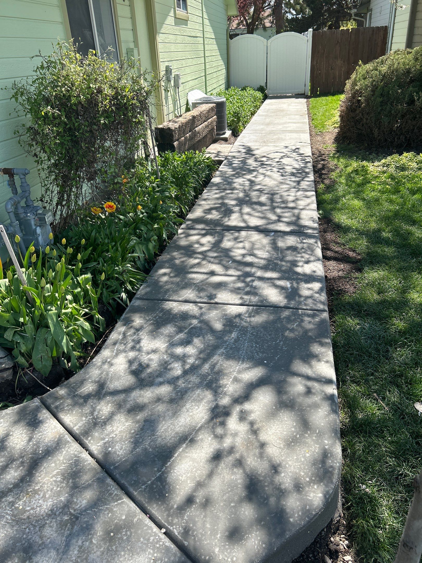 Gravel Walkway into Gorgeous New Concrete by Mr. Mudd Concrete