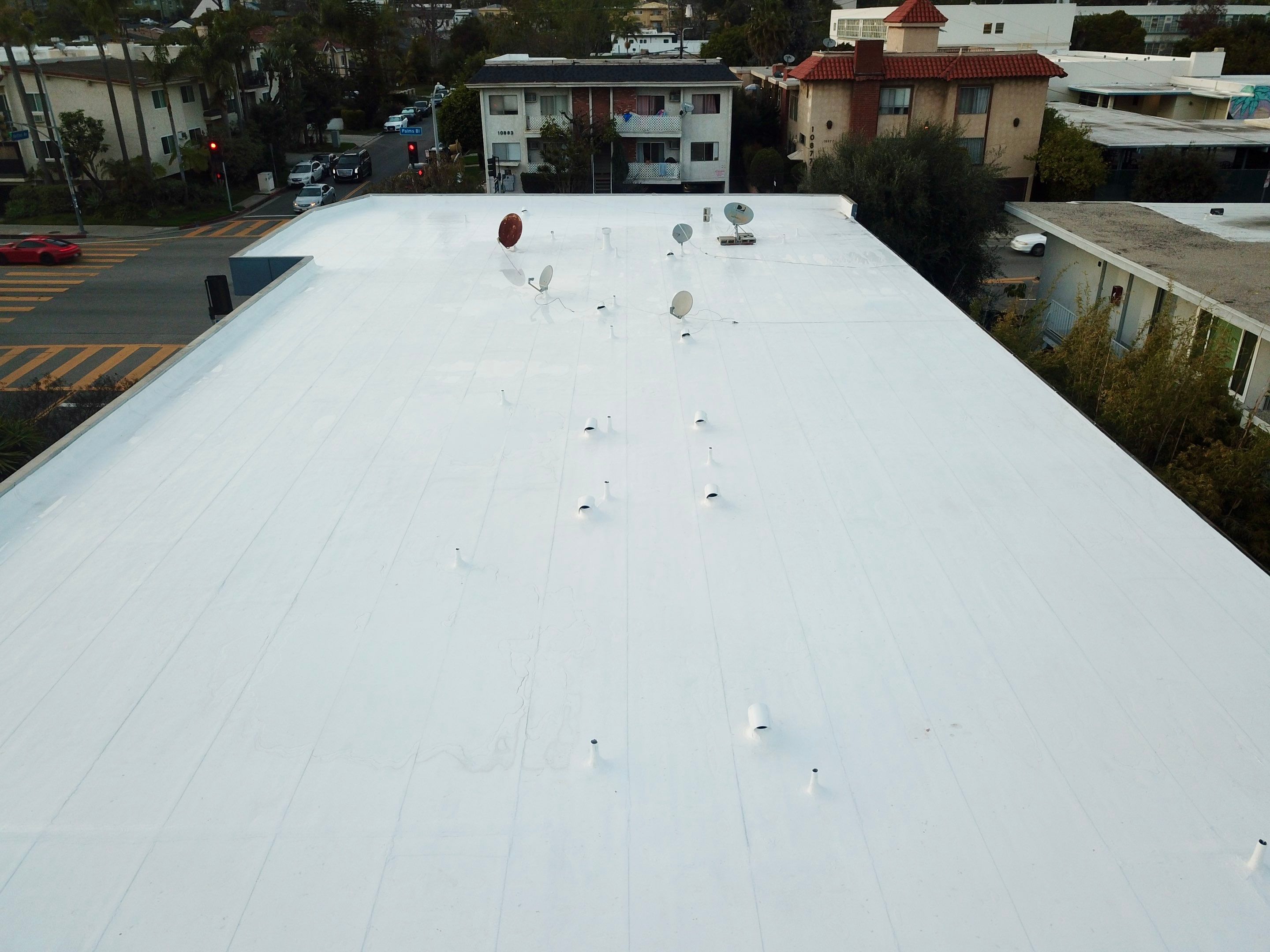 Apartment Building - Silicone Installation using ASC's Silicone Membrane by Hull Brothers Roofing