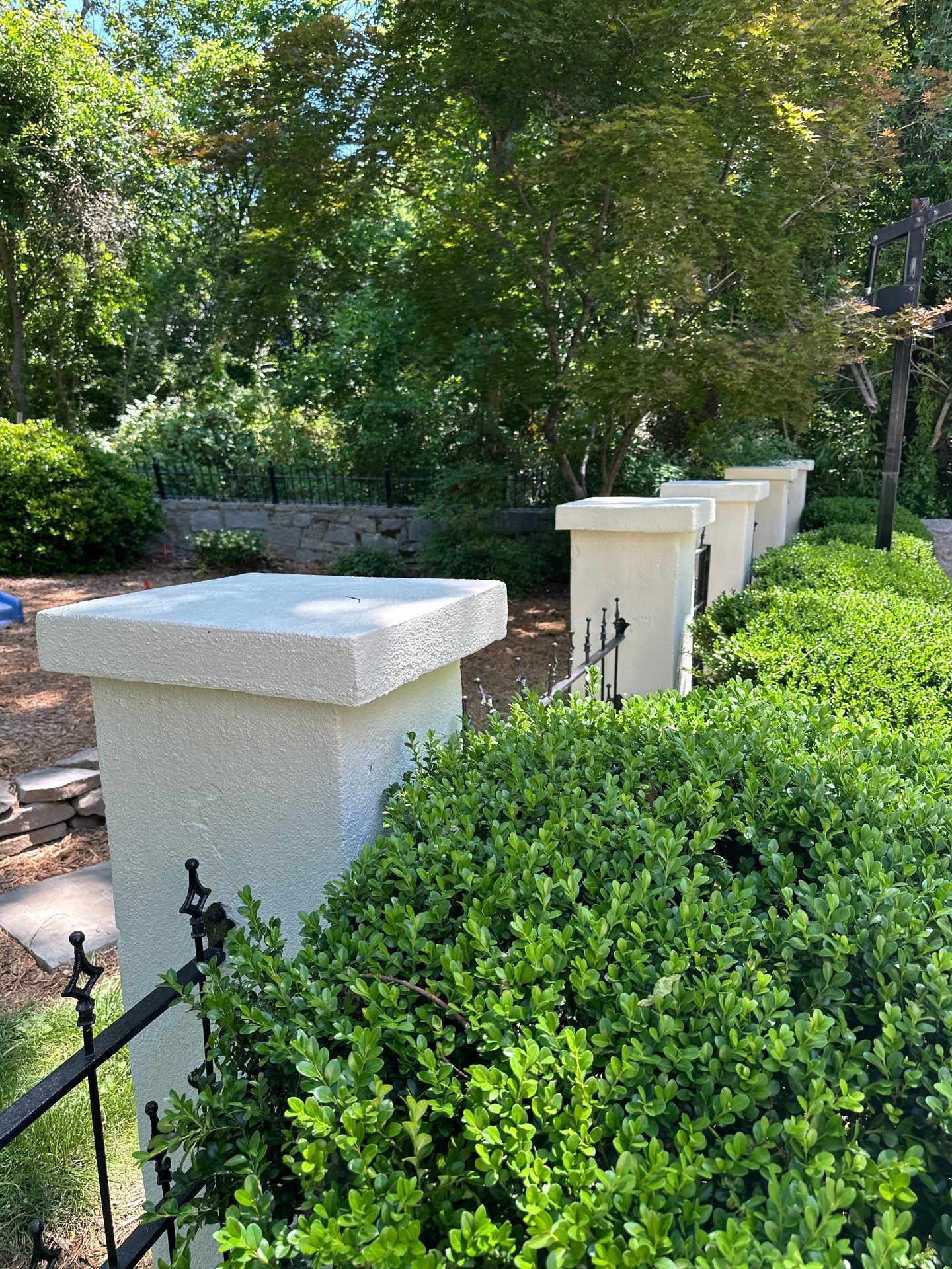 Rear Exterior Upgrade: Railings, Fence, and Stucco Column Restoration by Atlanta's Paint Doctor